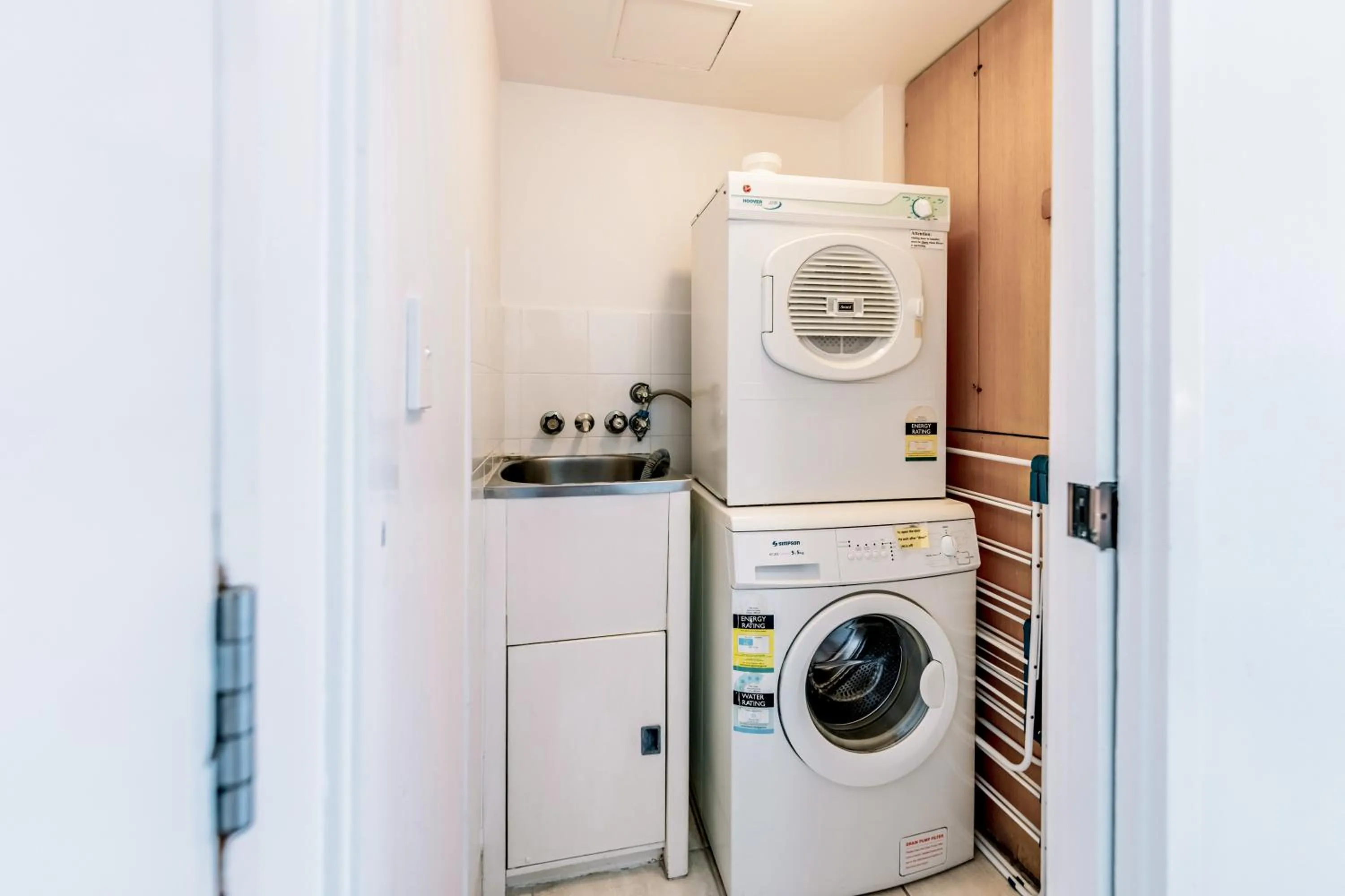 laundry in Olympus Beachfront Apartments