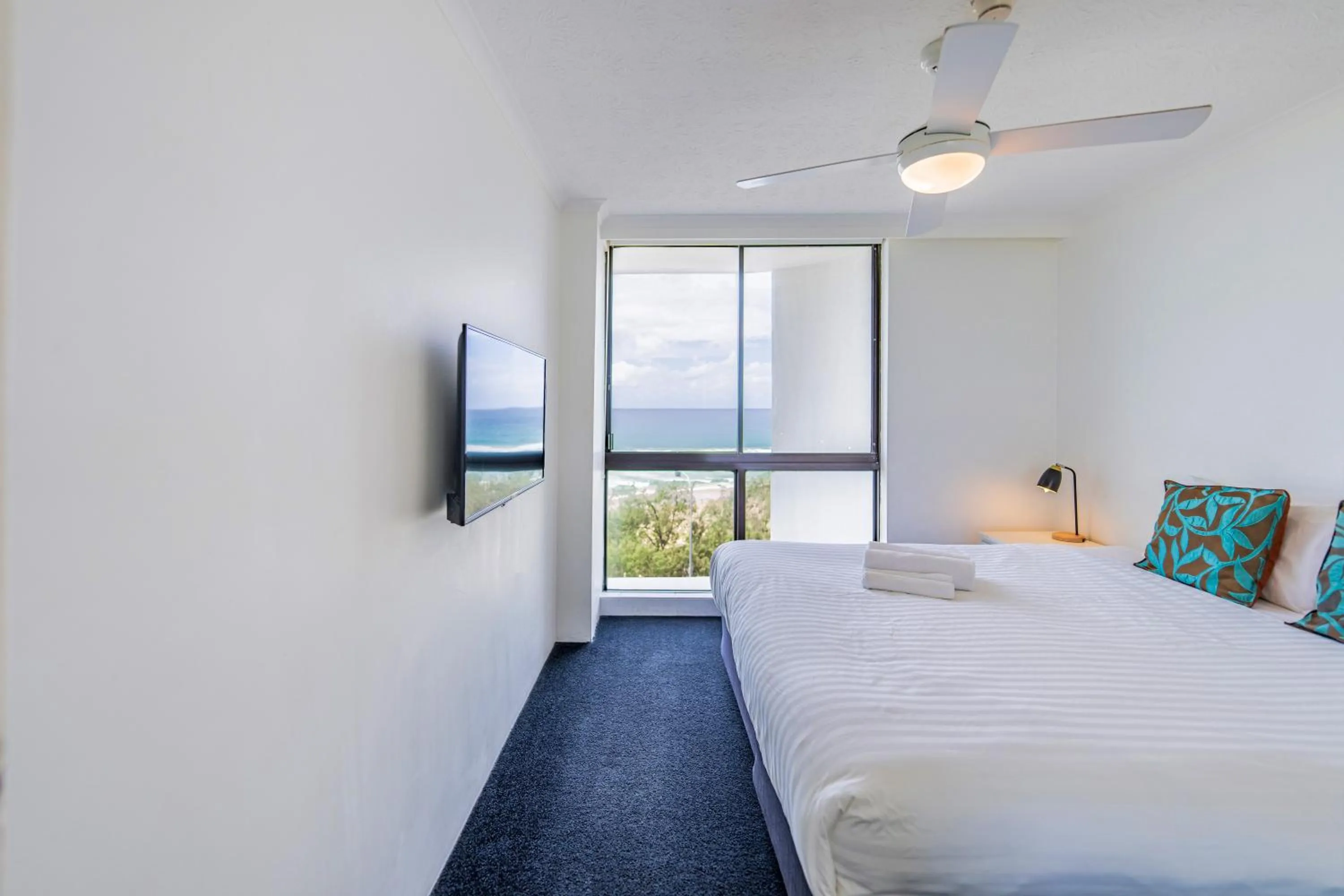 Bedroom, Bed in Olympus Beachfront Apartments