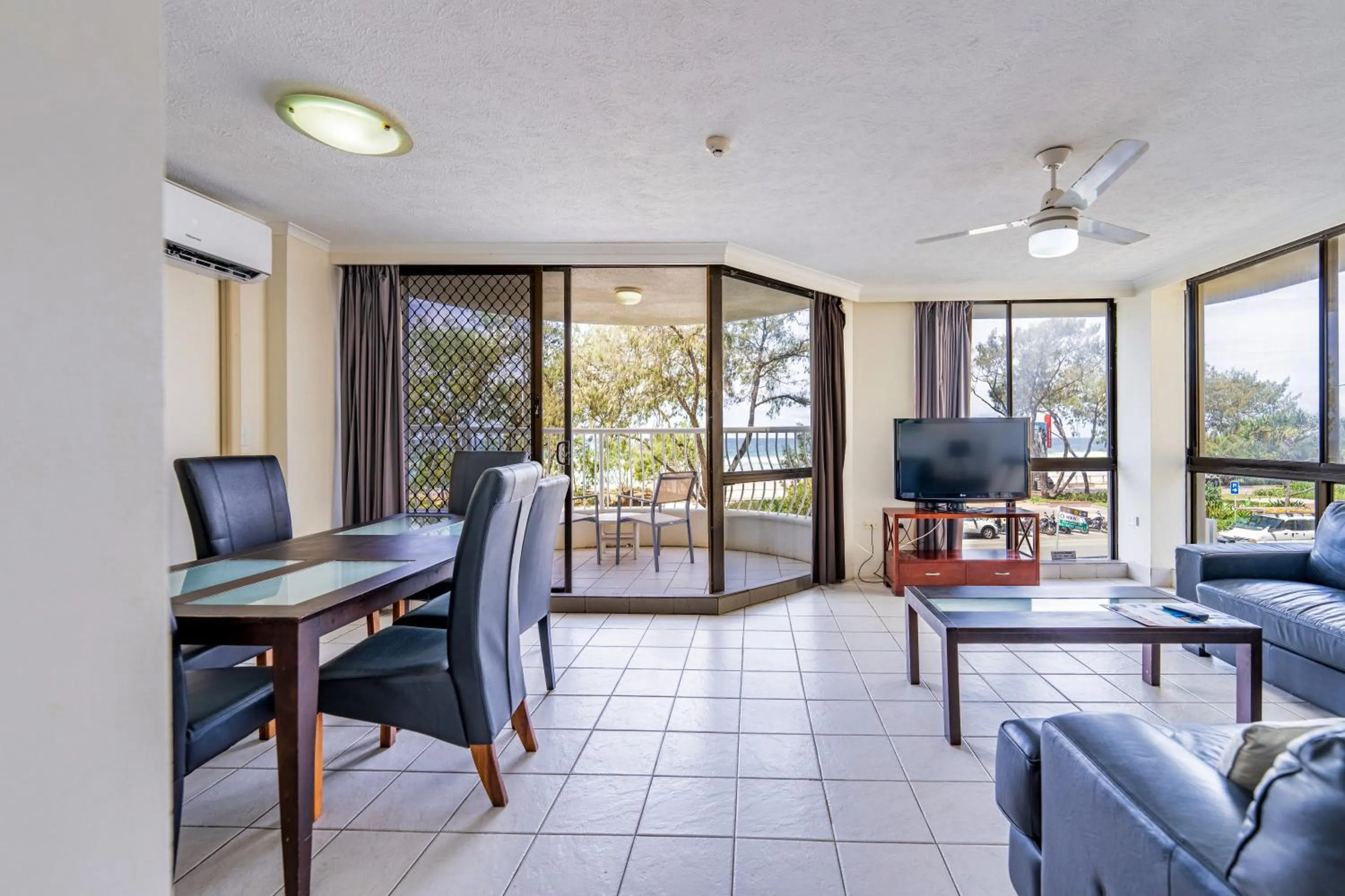 Living room in Olympus Beachfront Apartments