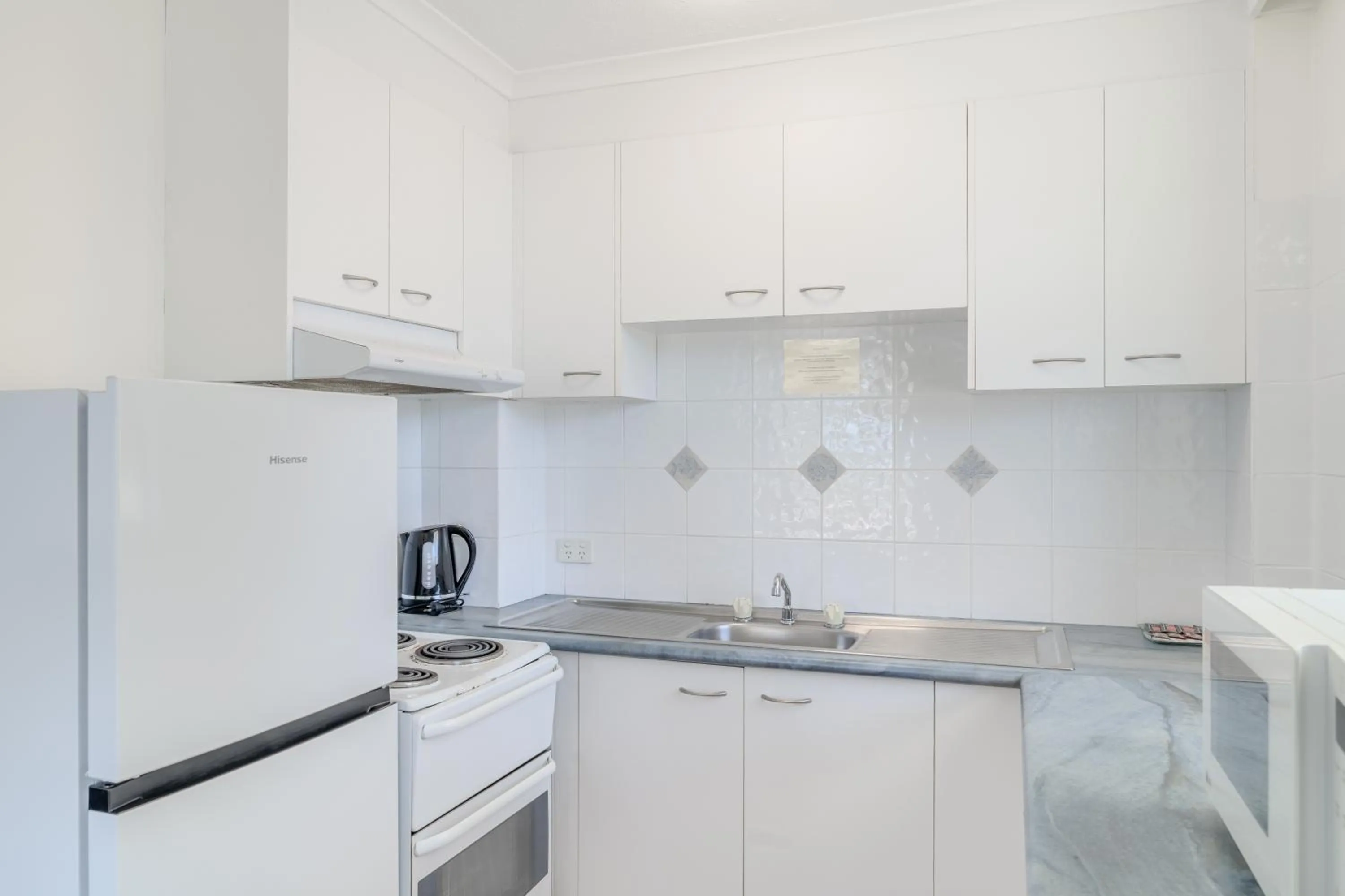 kitchen in Olympus Beachfront Apartments