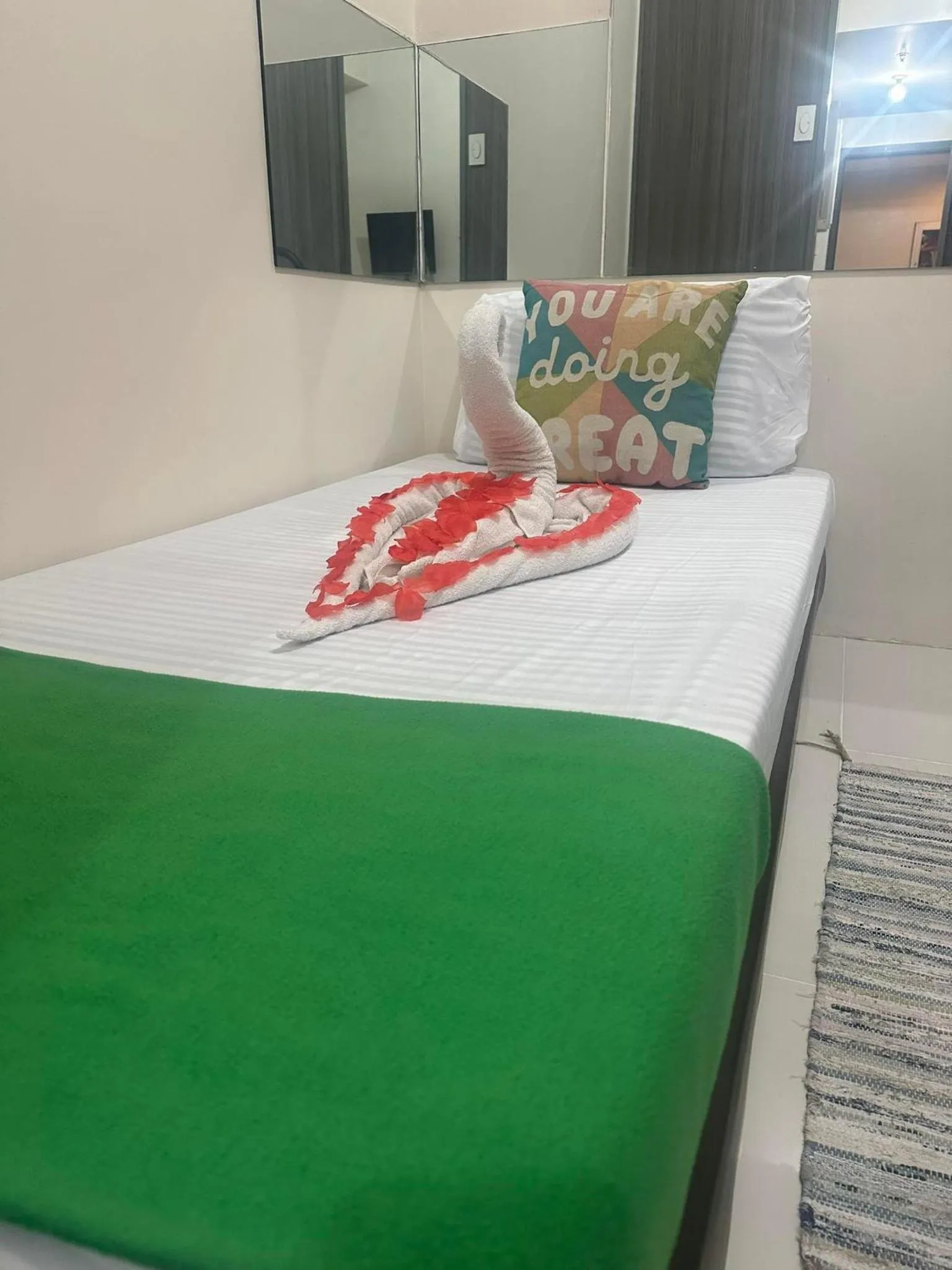 Bed in Green Residences Stays by PBYY