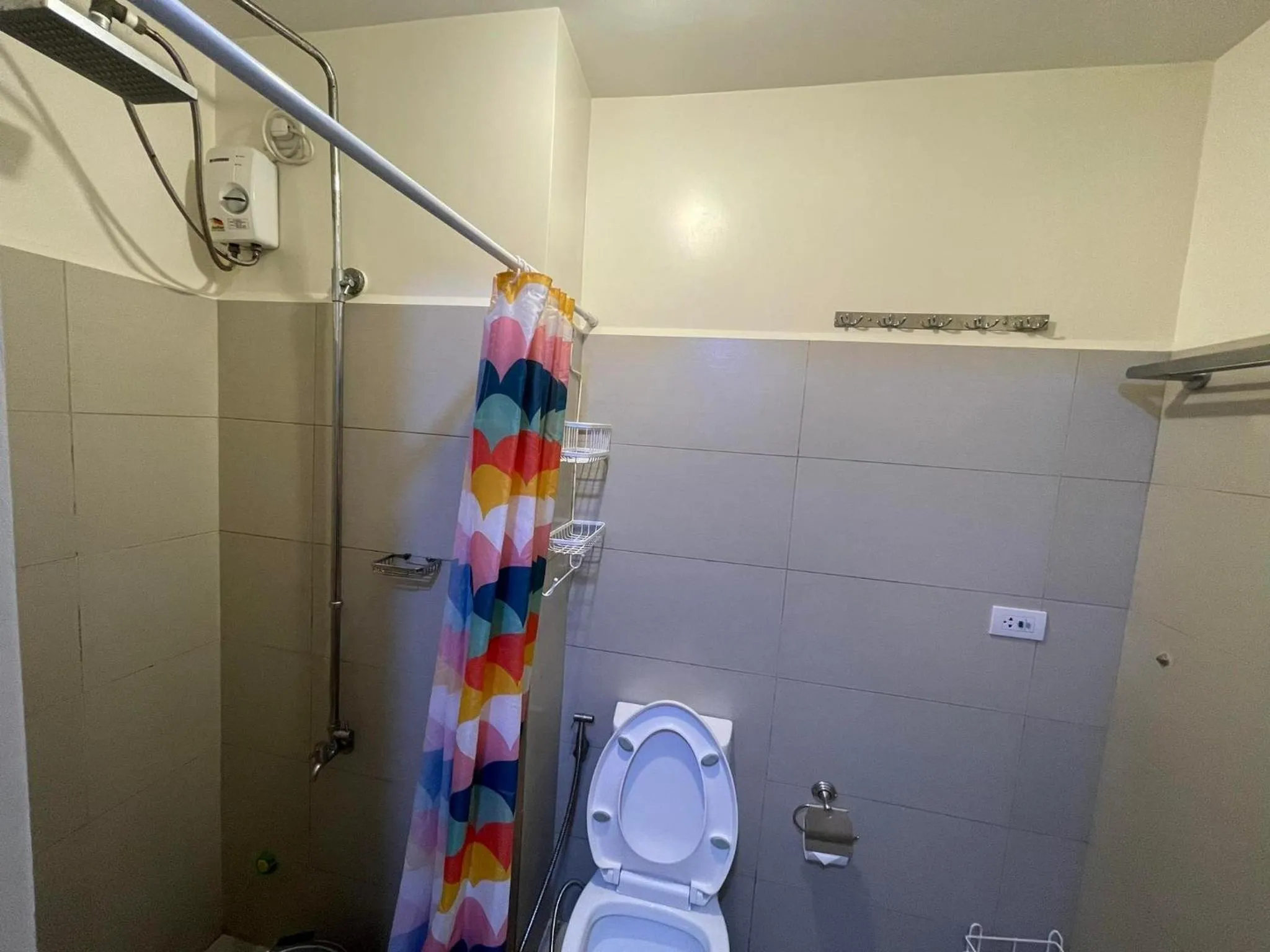 Shower in Green Residences Stays by PBYY