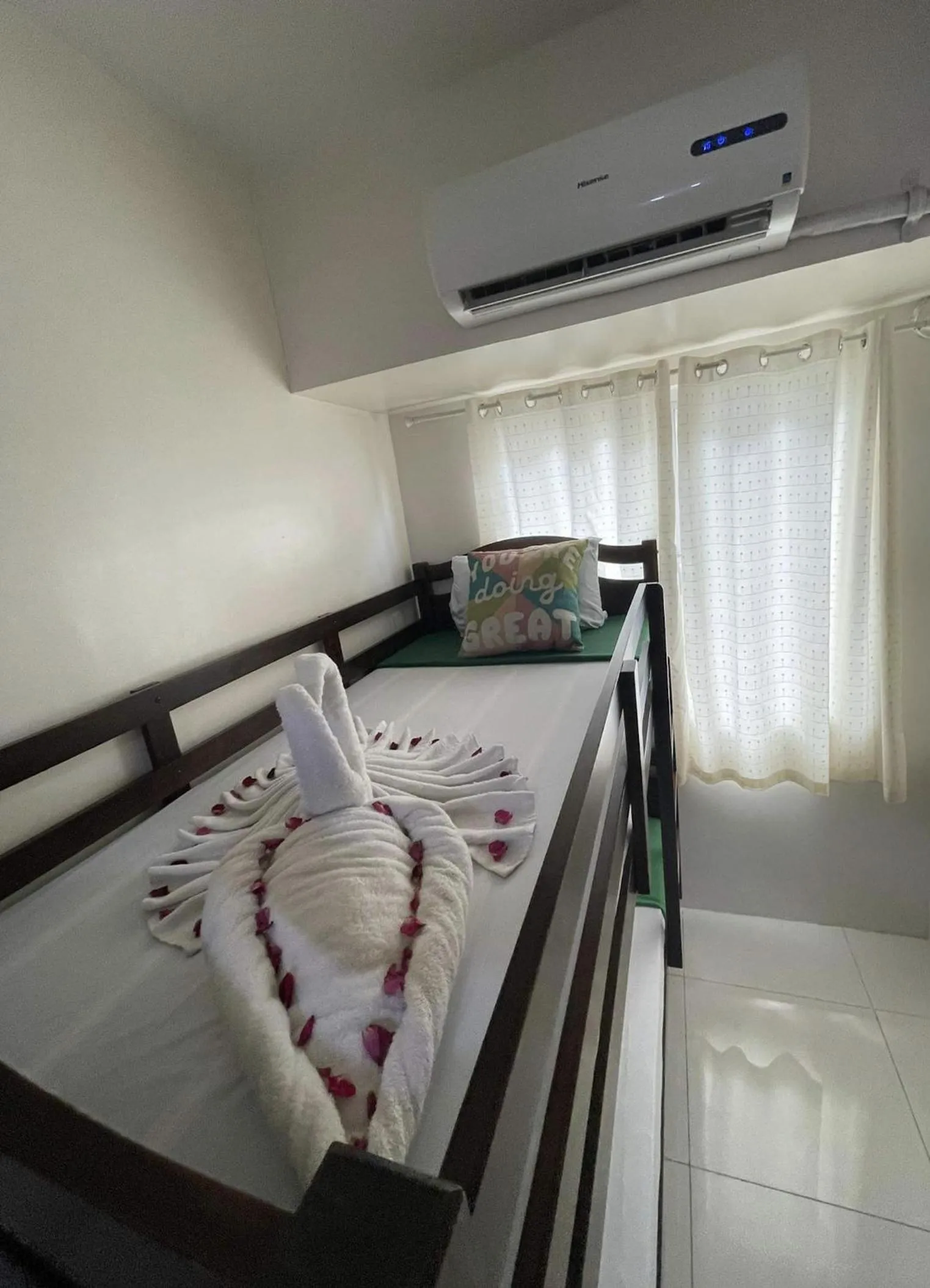 Bed in Green Residences Stays by PBYY