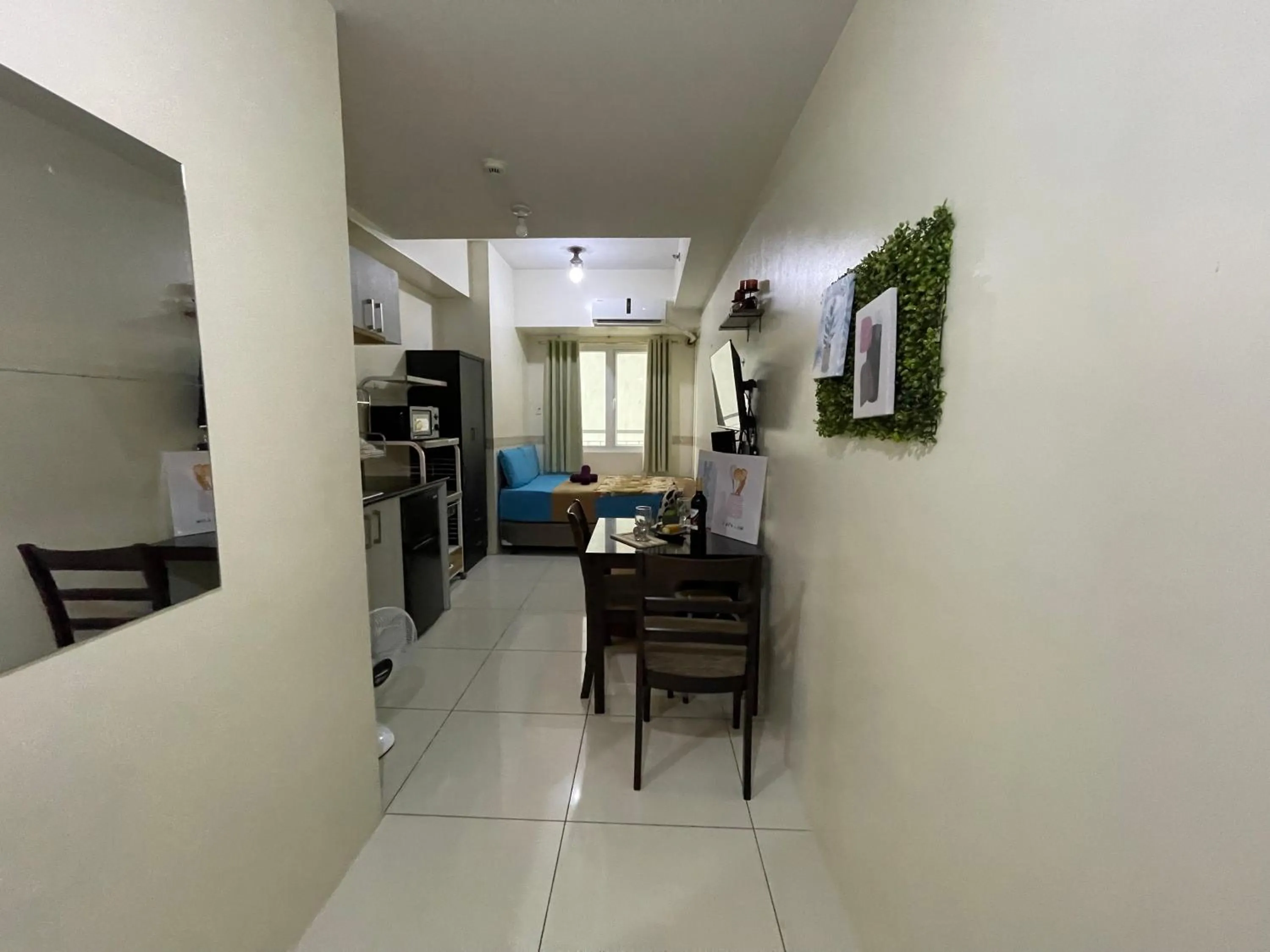 TV and multimedia in Green Residences Stays by PBYY