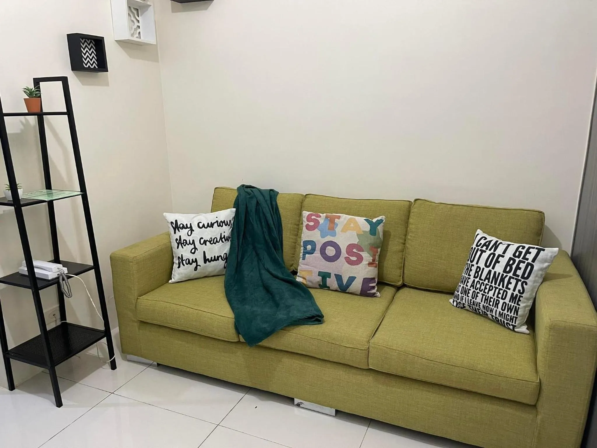 Living room in Green Residences Stays by PBYY