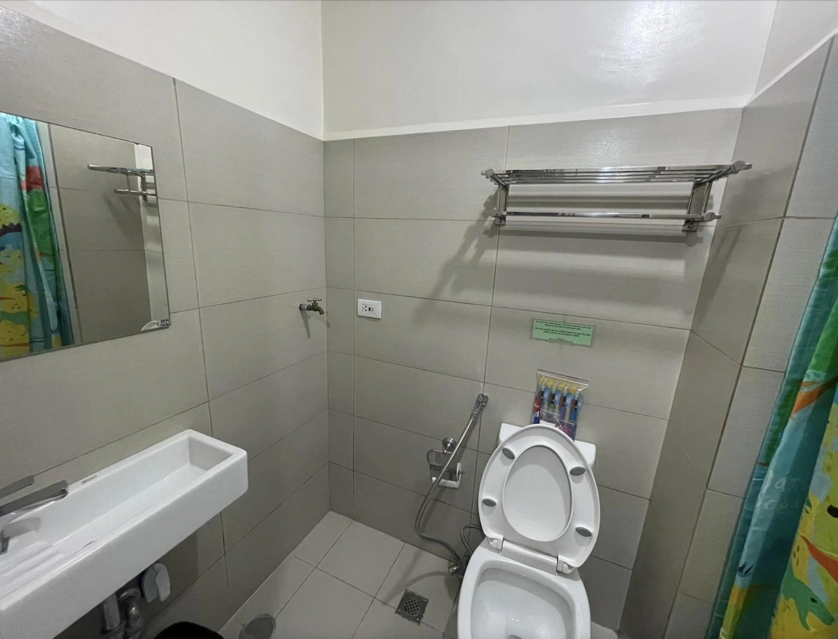 Shower in Green Residences Stays by PBYY