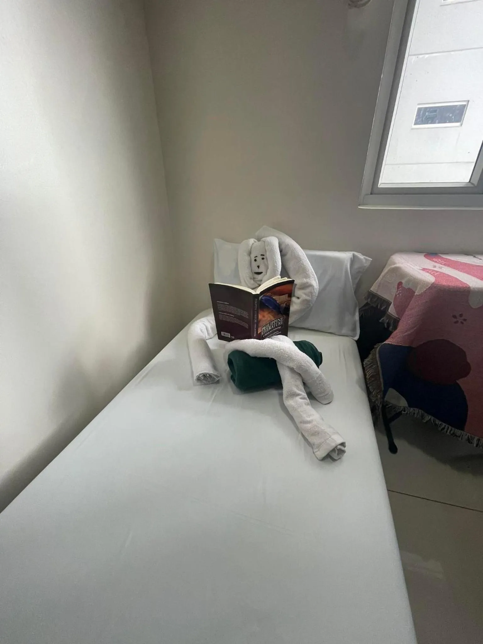 Bed in Green Residences Stays by PBYY