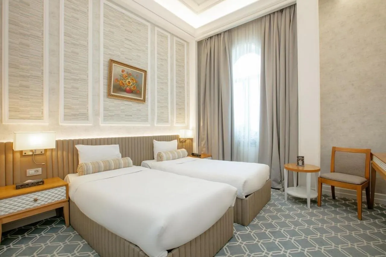 Photo of the whole room, Bed in Promenade Hotel Baku
