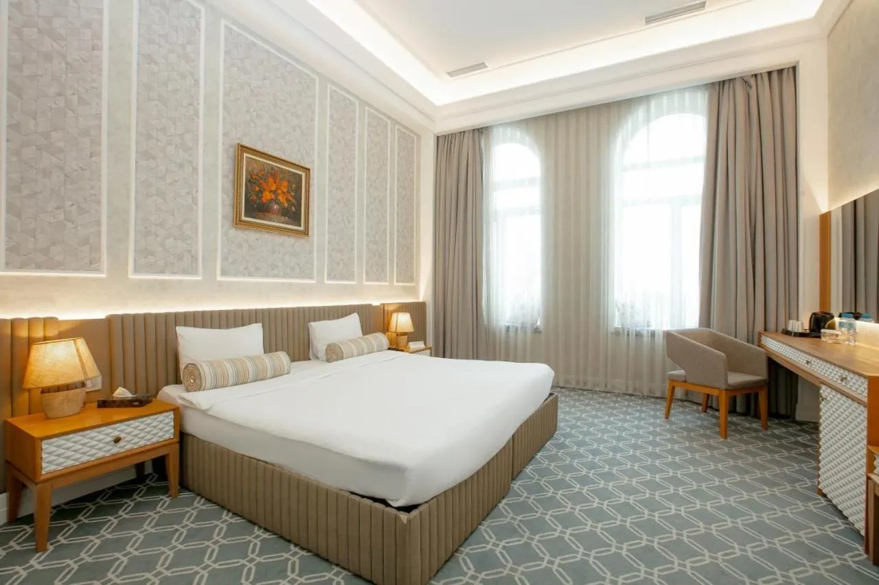 Photo of the whole room, Bed in Promenade Hotel Baku