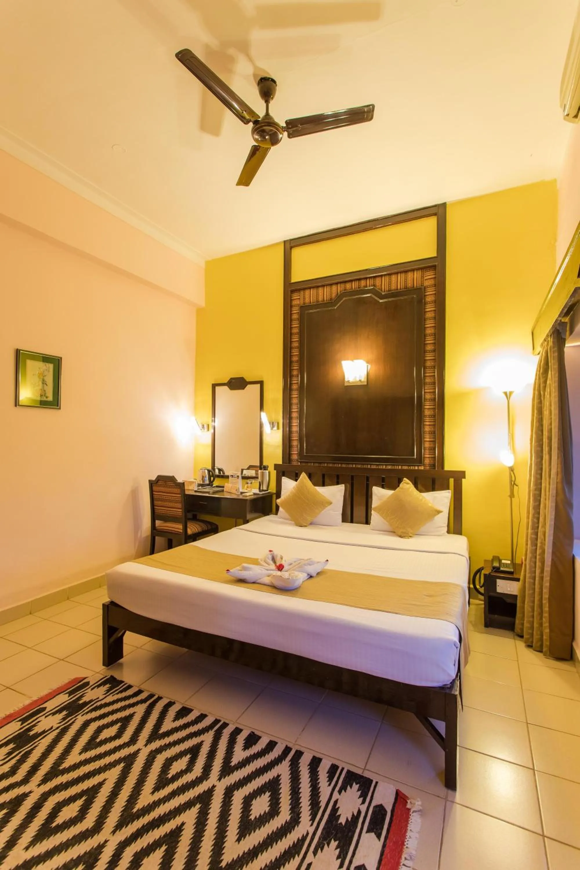 Bed in Hotel Coorg International