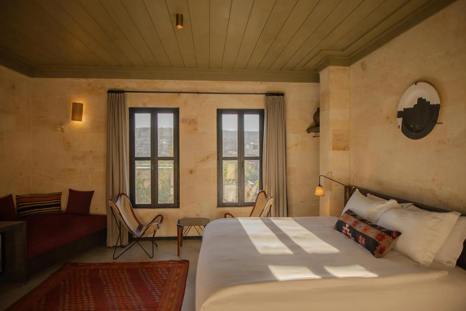 Seating area, Bed in Carus Cappadocia