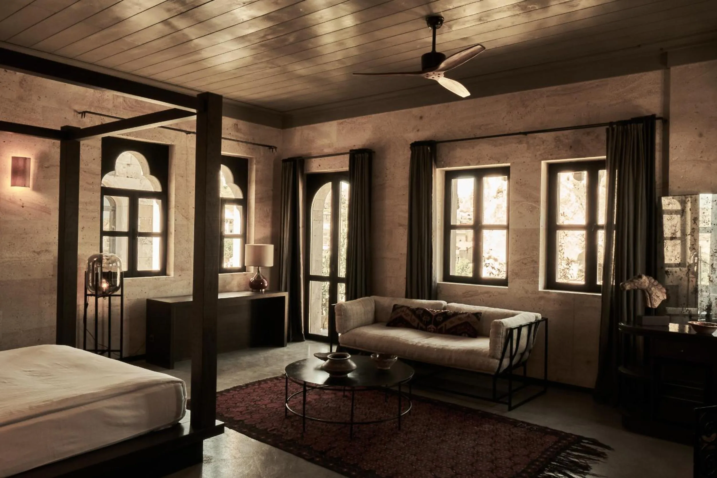 Seating area, Bed in Carus Cappadocia