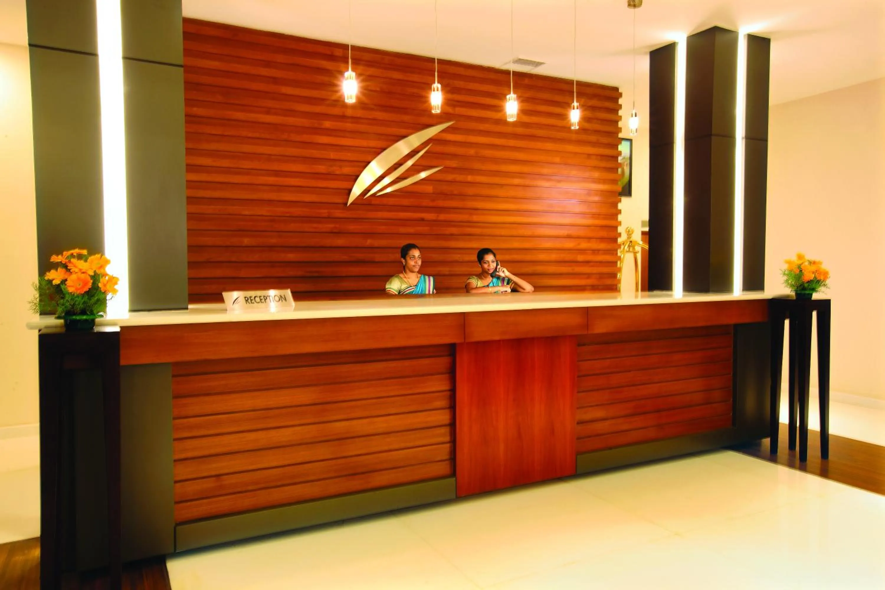 Staff in Holiday Vista Thekkady a premium hotel near periyar wild life sanctuary with sky view pool