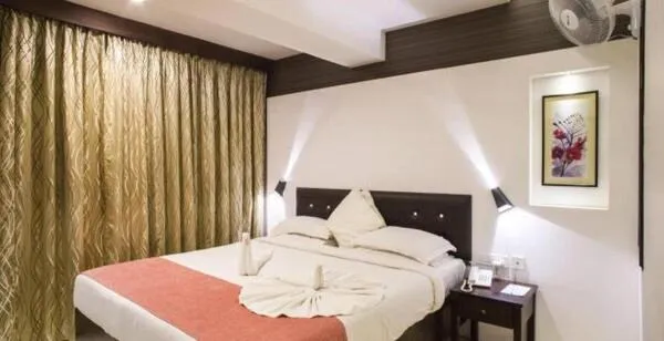 Bed in Holiday Vista Thekkady a premium hotel near periyar wild life sanctuary with sky view pool