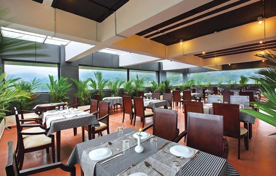 Restaurant/places to eat in Holiday Vista Thekkady a premium hotel near periyar wild life sanctuary with sky view pool