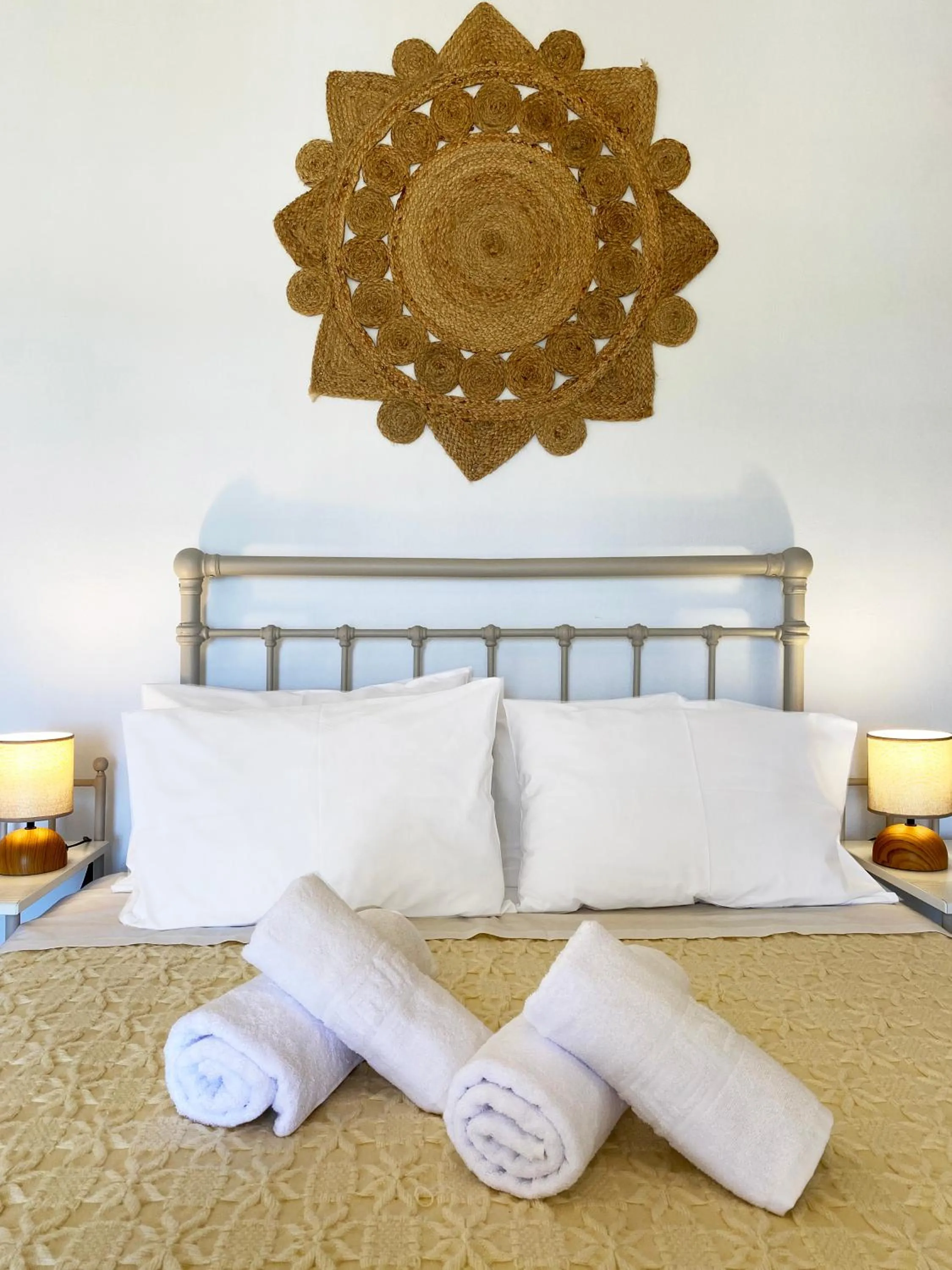 Bed in Agnadi Syros Beachfront Studios & Rooms