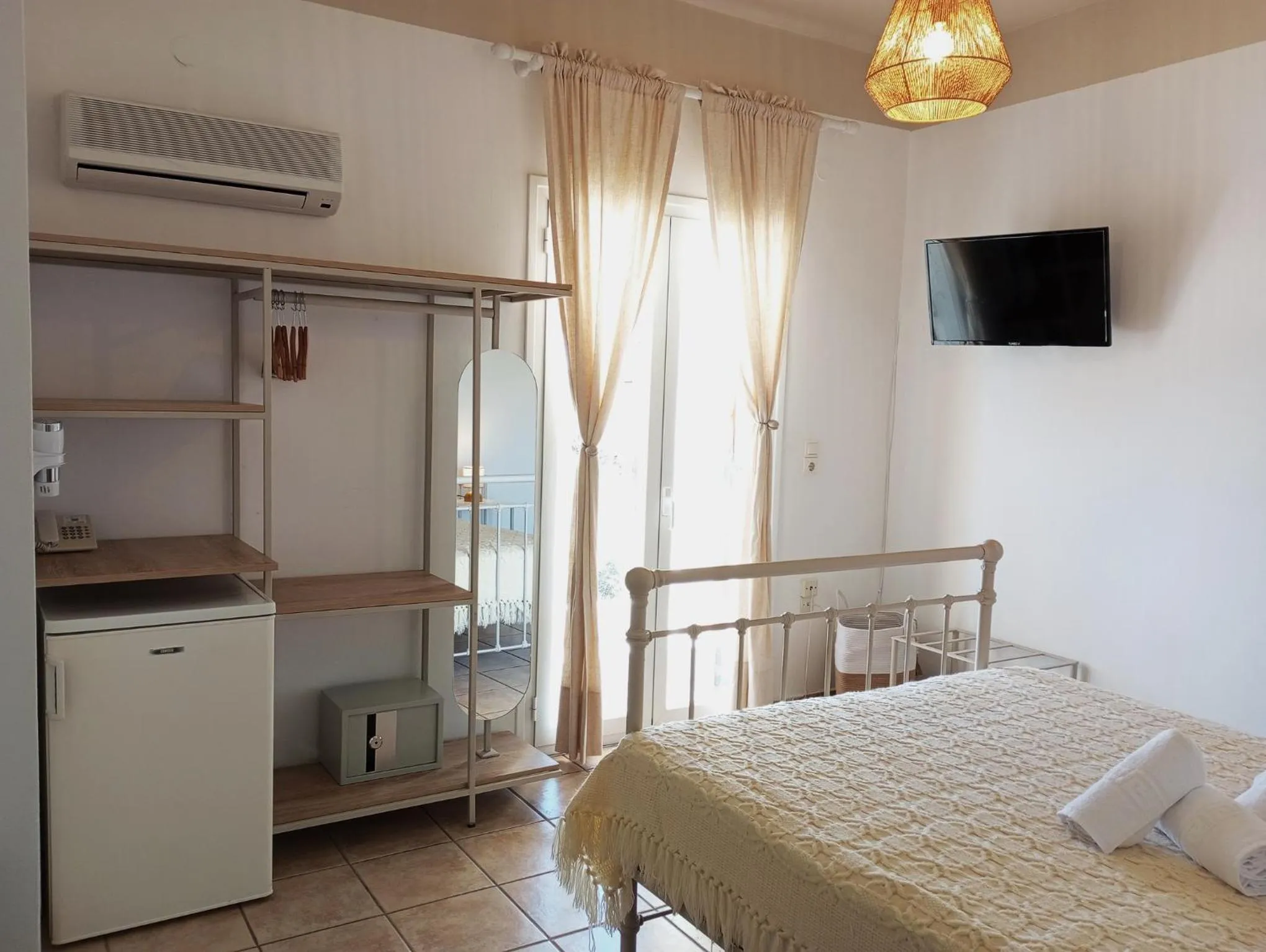 wardrobe, Bed in Agnadi Syros Beachfront Studios & Rooms