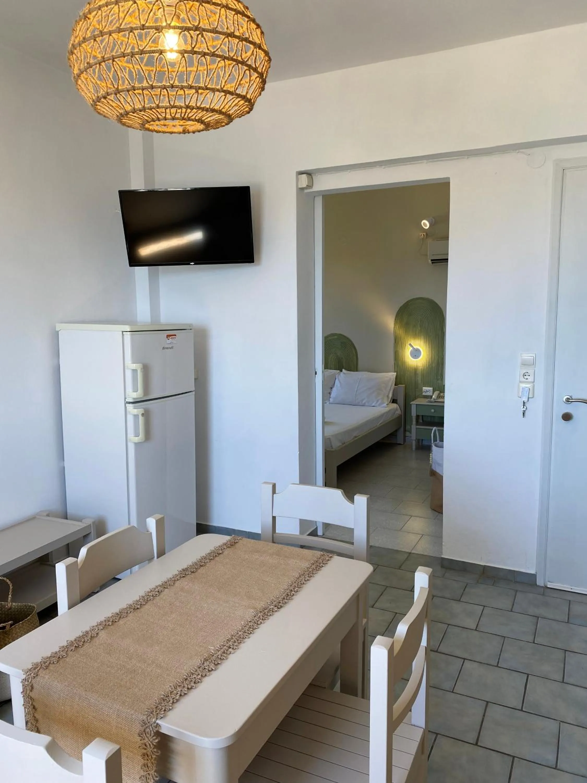 Living room, Bed in Agnadi Syros Beachfront Studios & Rooms