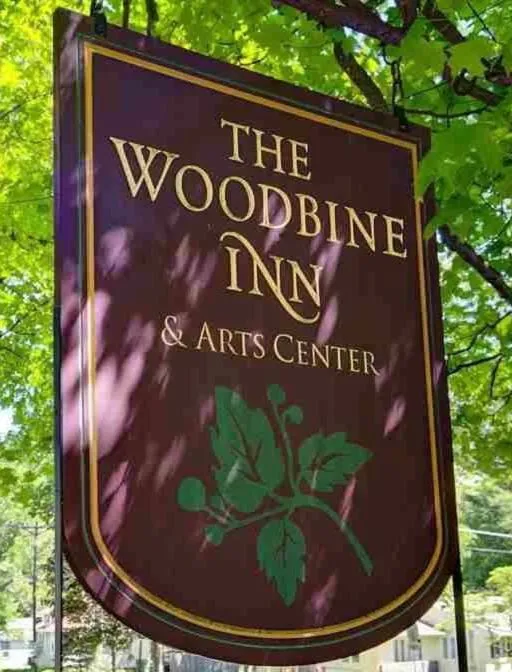 Property logo or sign in The Woodbine Inn