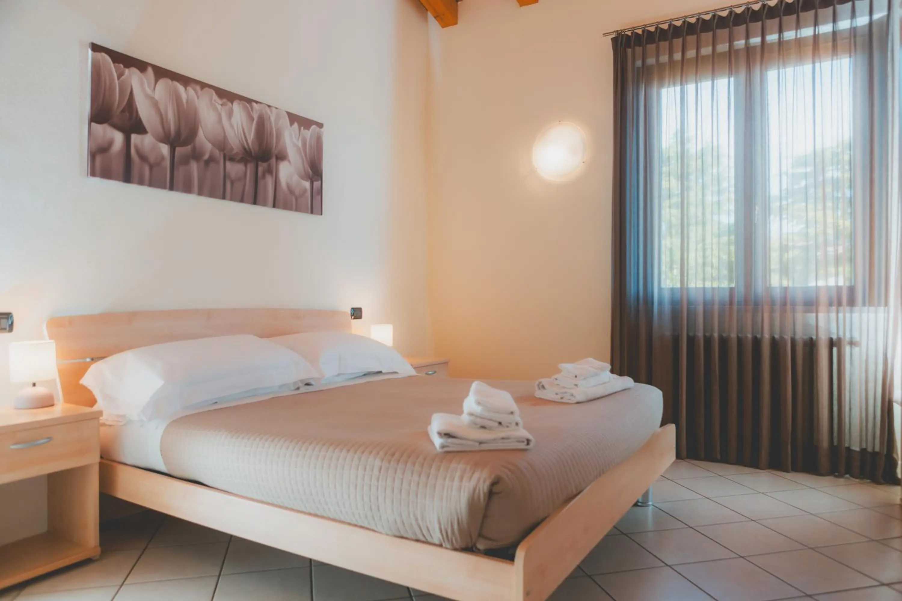 Bed in AHG Donna Silvia Wellness Hotel