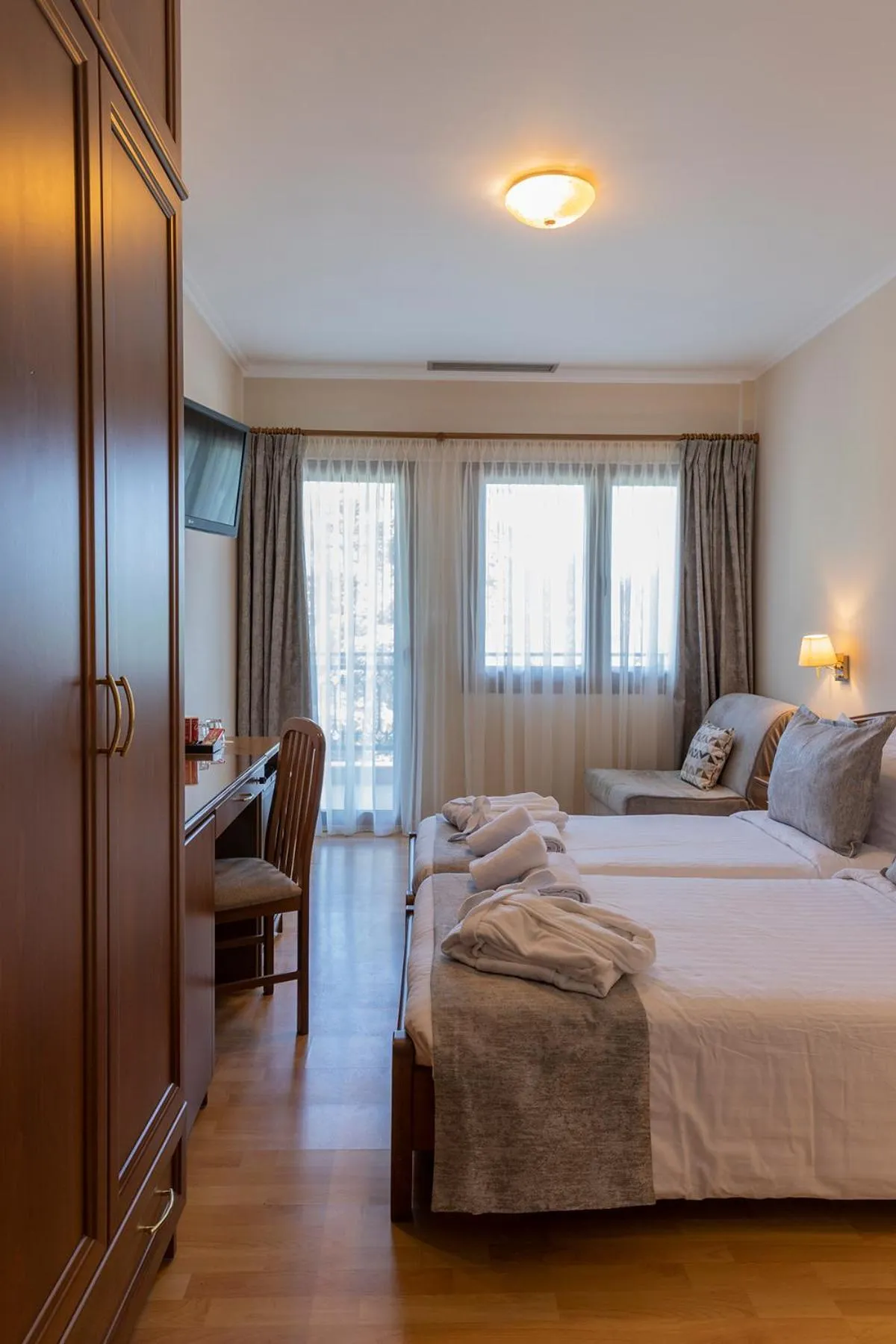 Bed in Xenios Dias Boutique Hotel