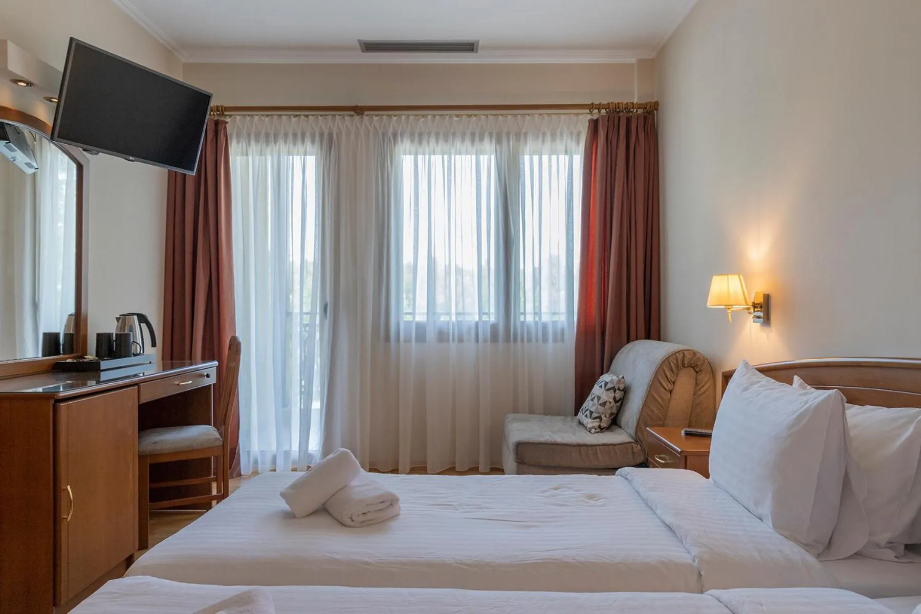 Bed in Xenios Dias Boutique Hotel