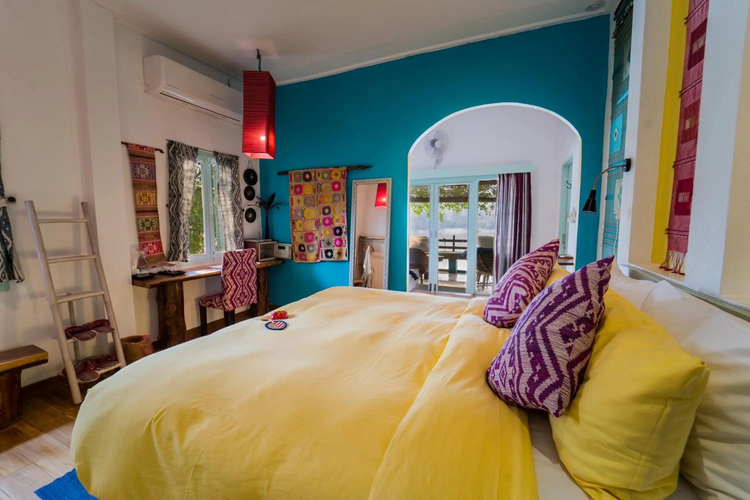 Bed in Ock Pop Tok Mekong Villa