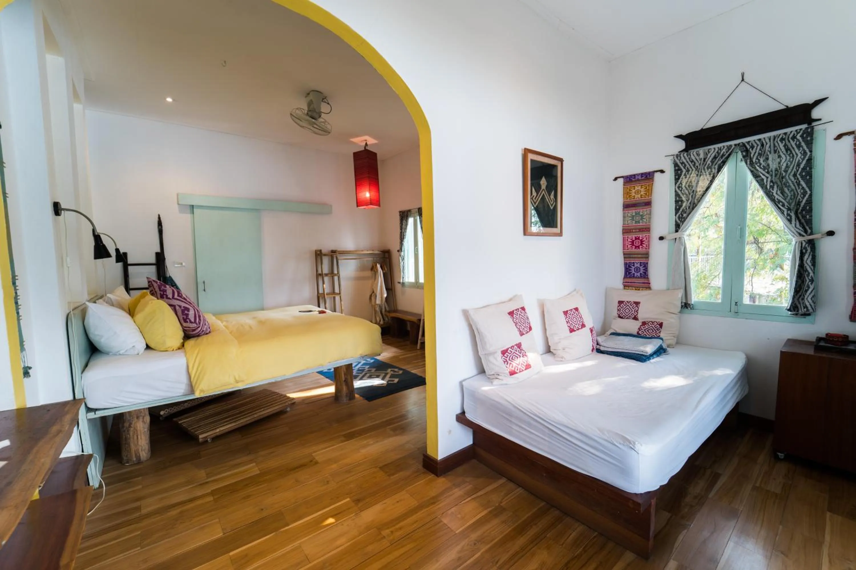 Photo of the whole room, Bed in Ock Pop Tok Mekong Villa