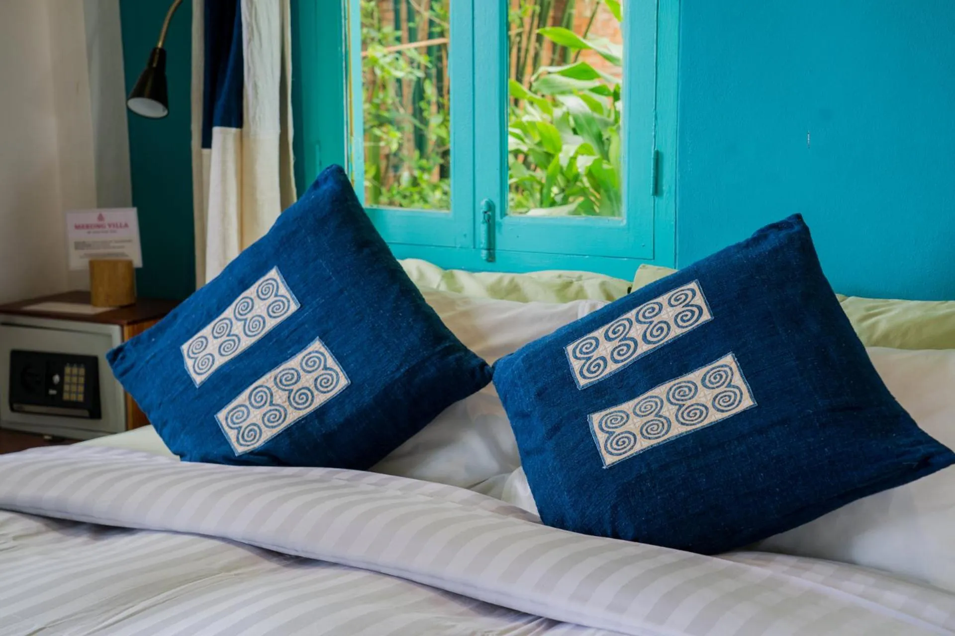 Bed in Ock Pop Tok Mekong Villa