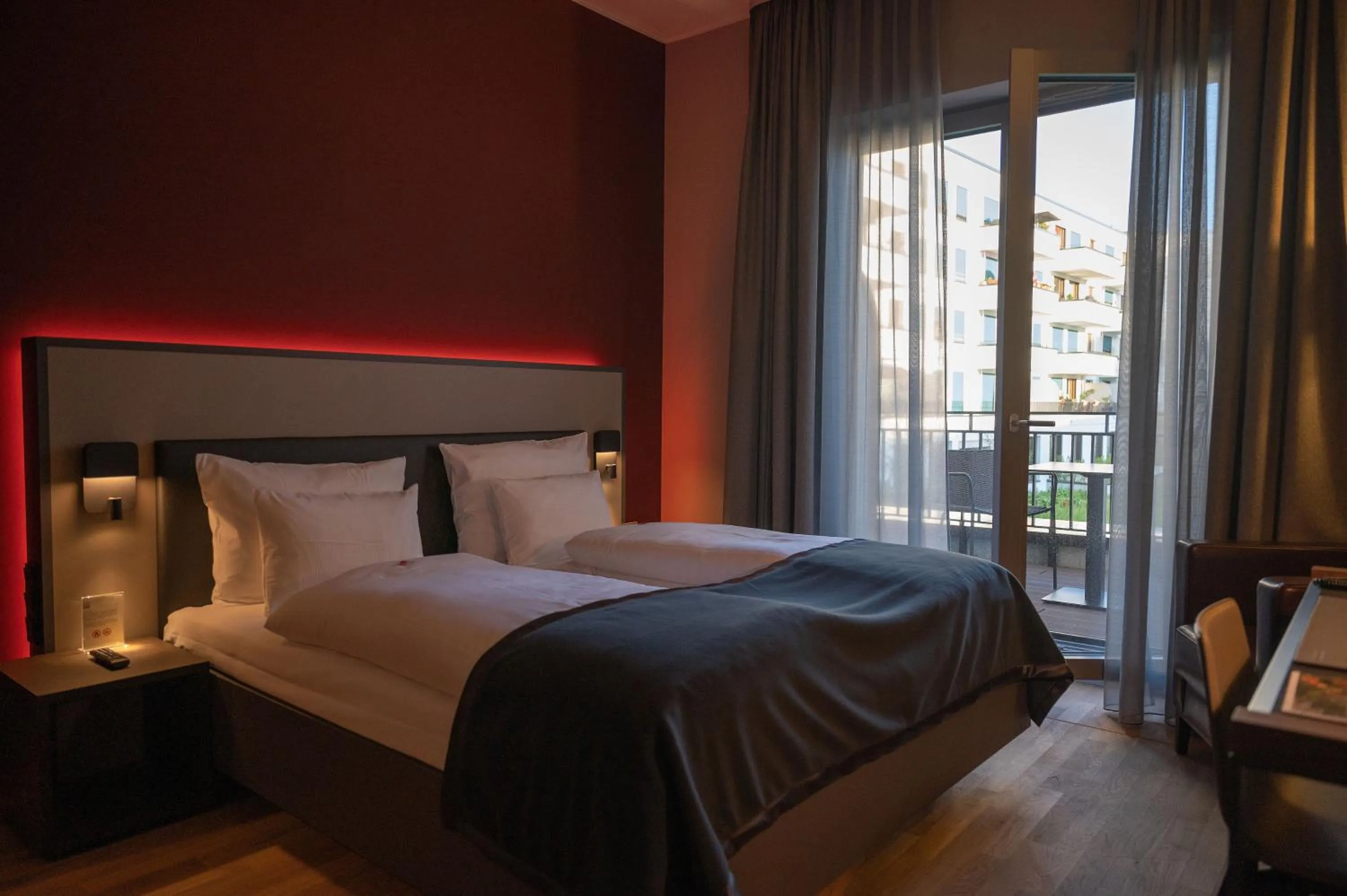 Photo of the whole room, Bed in Qube Hotel Bahnstadt