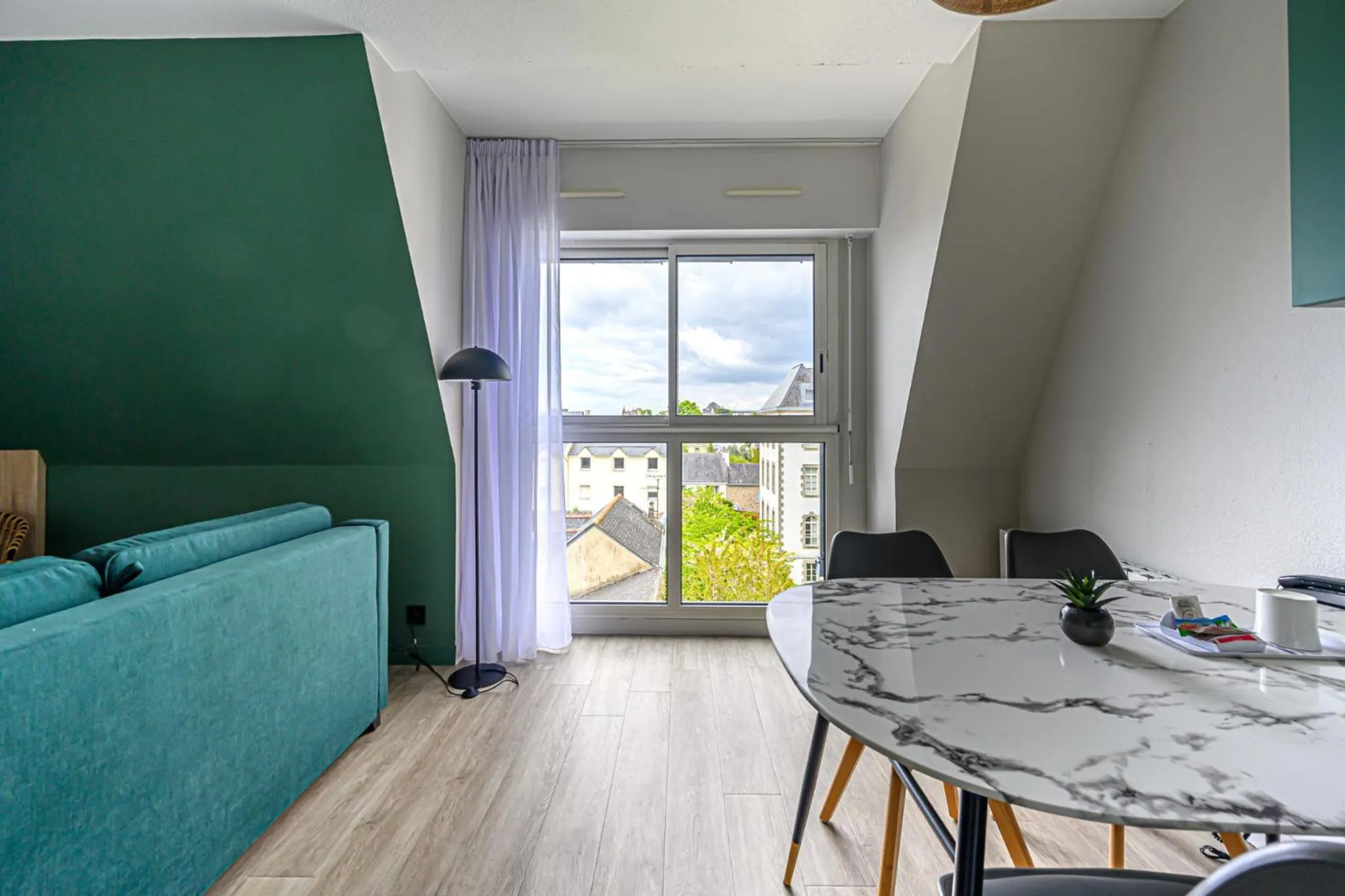 Living room in Appart Hôtel Le Liberté Vannes Centre-Ville