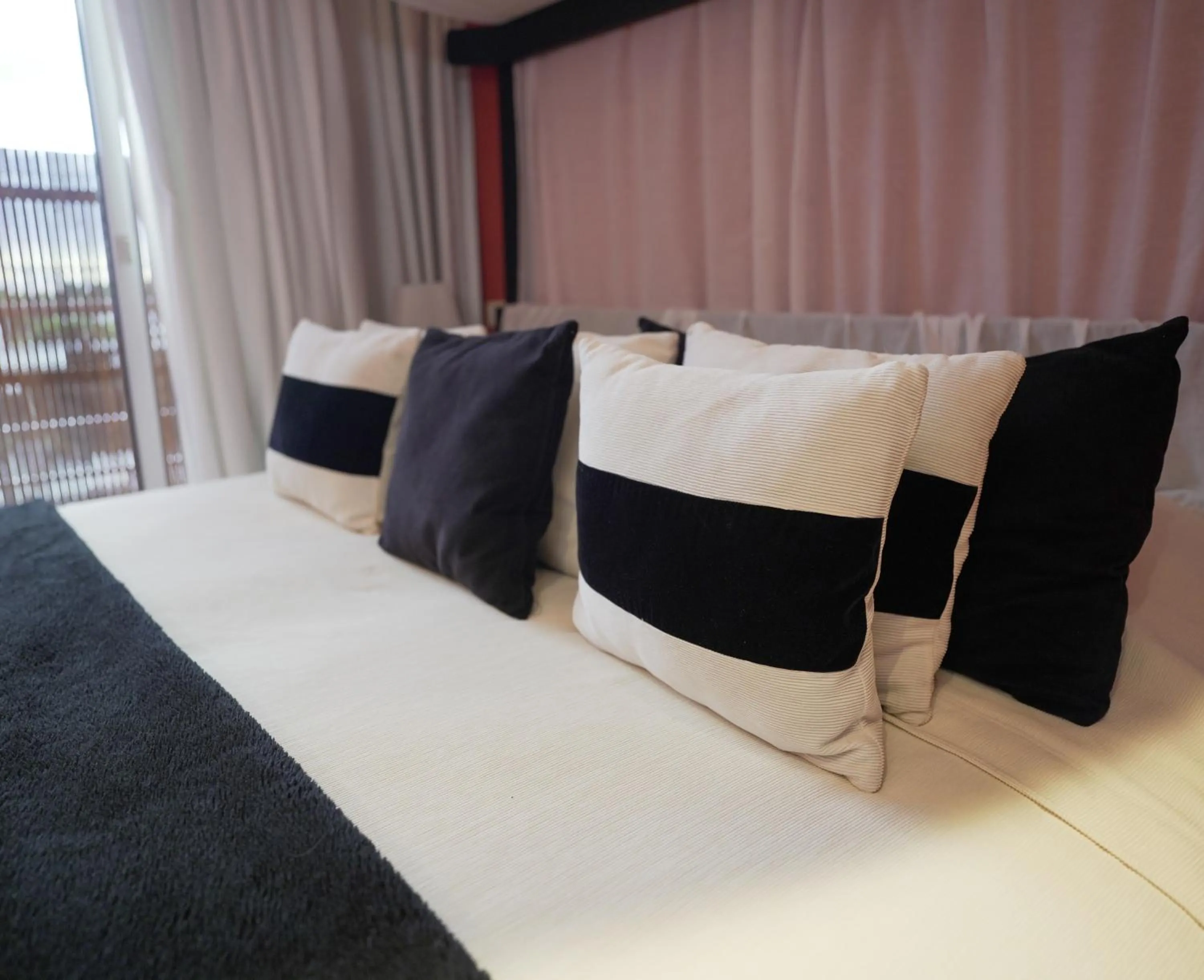 Bed in Los Muelles Boutique Hotel