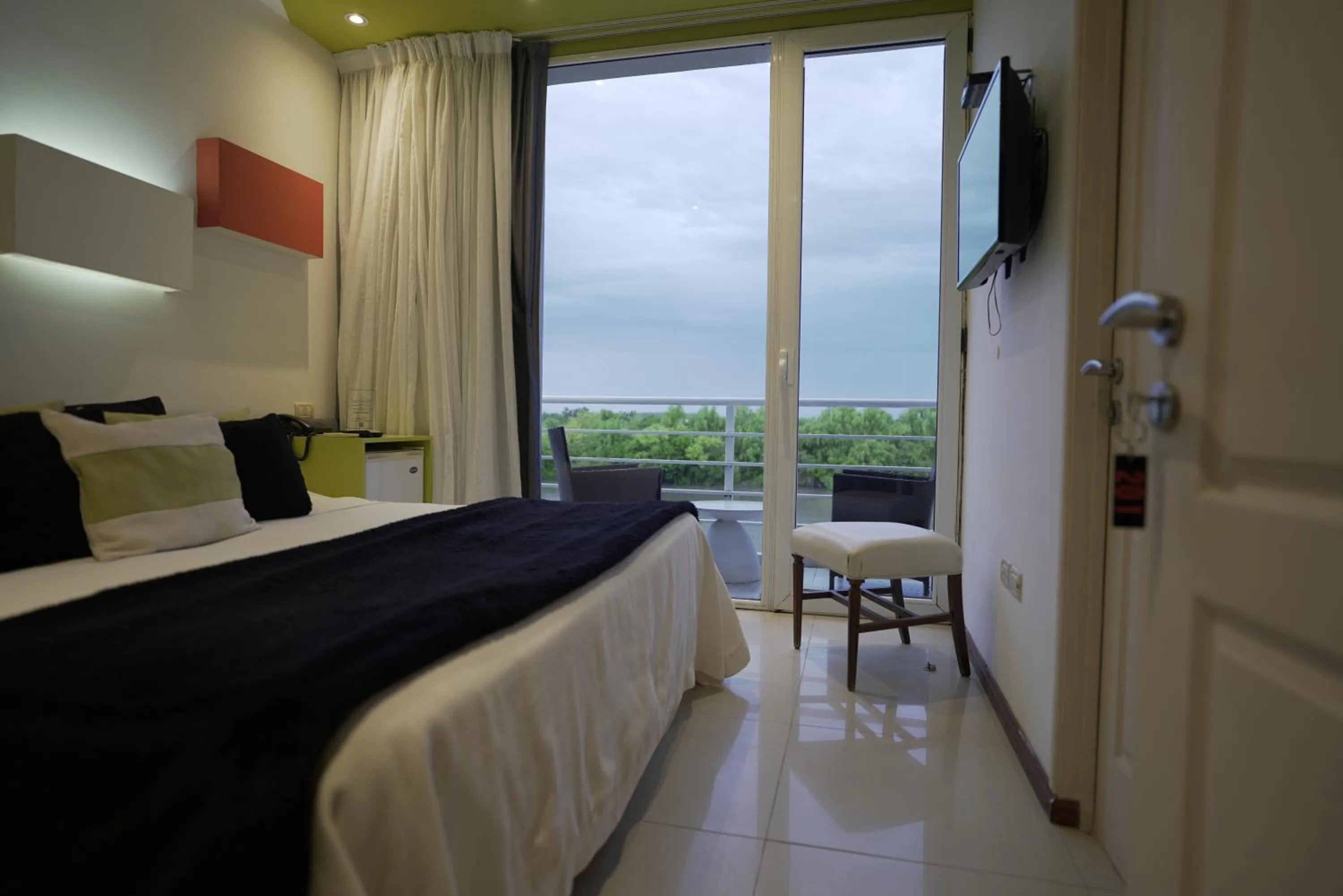 Bed in Los Muelles Boutique Hotel