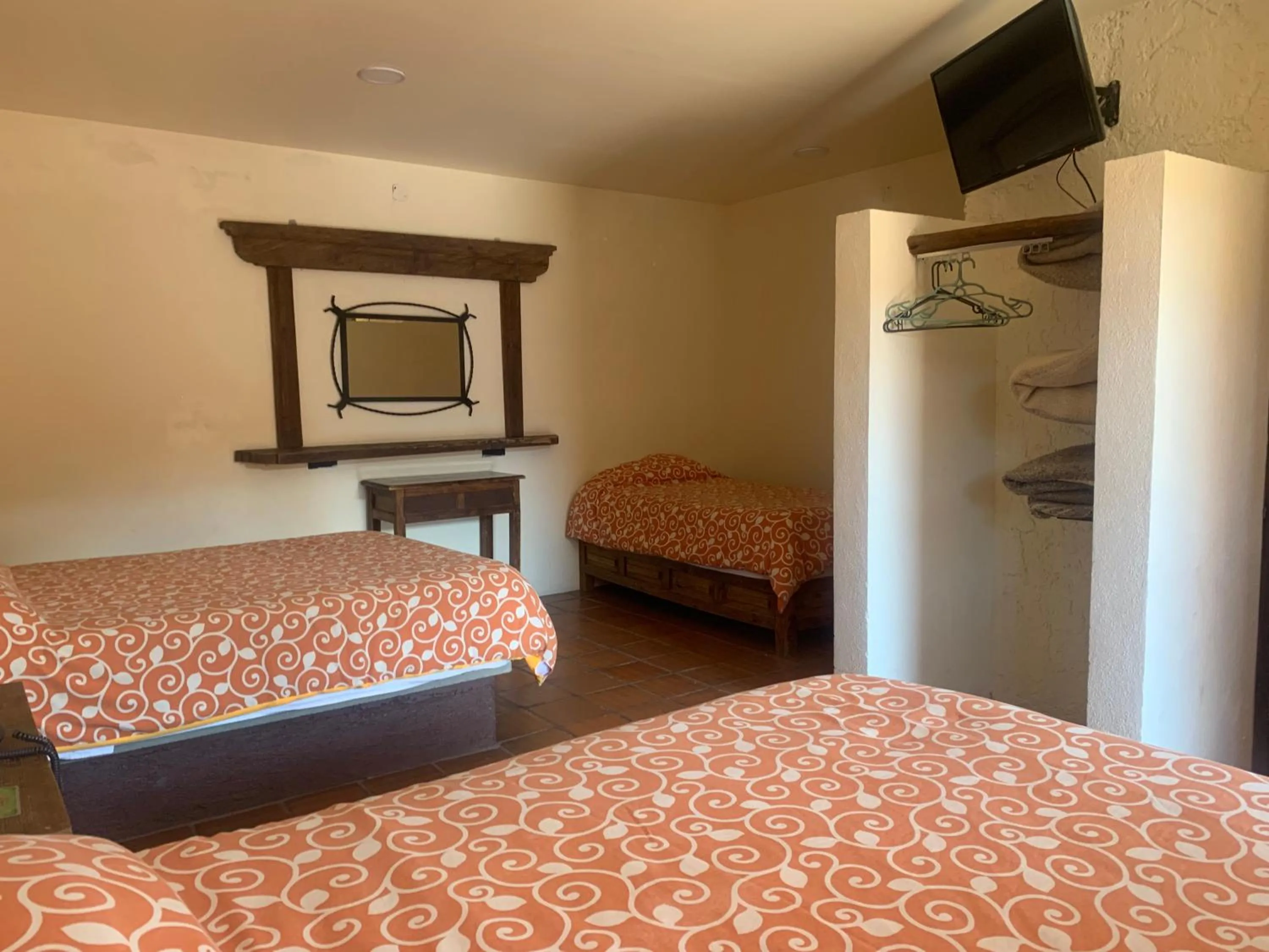 Bed in Hotel Posada Don Ramon