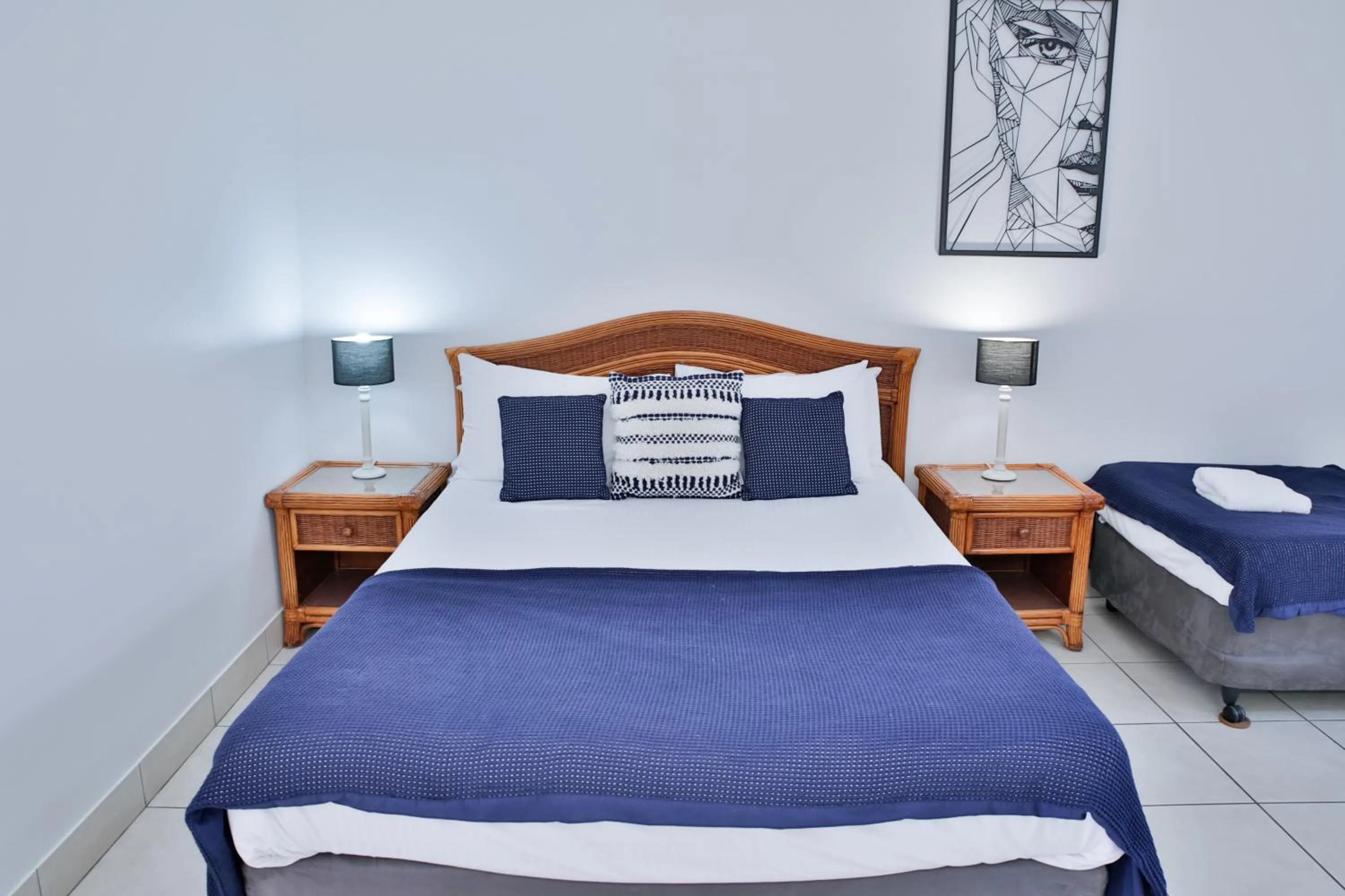 Bed in Central Park Motel