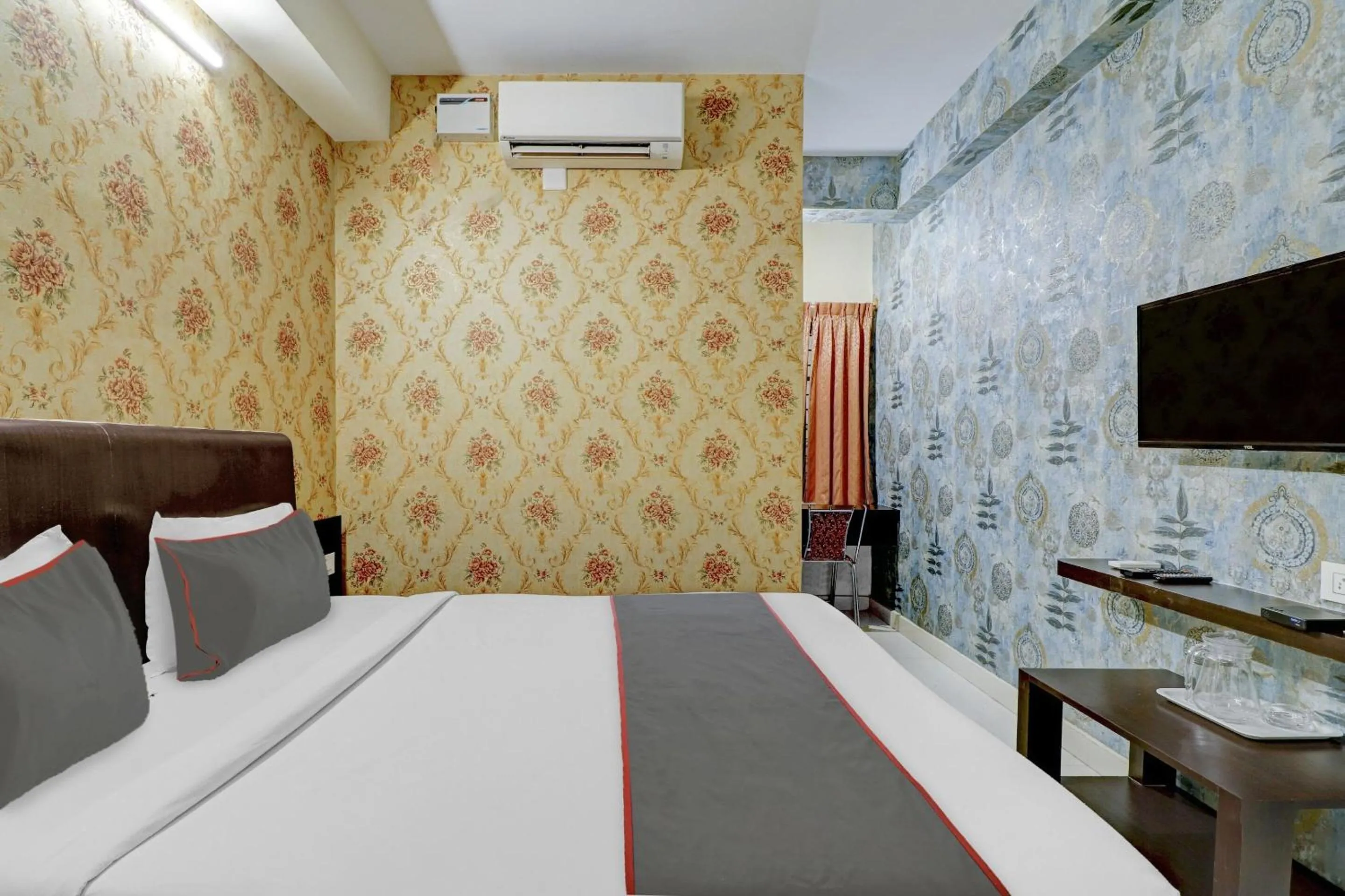 Bedroom, Bed in Capital O Champion Lotus Near Mantri Square Mall