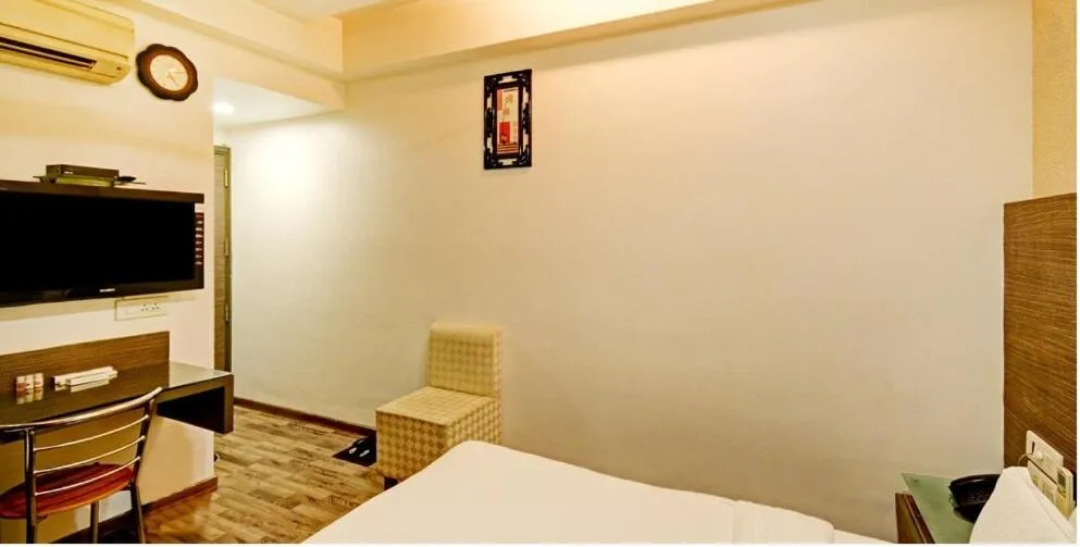 Bed in Atithi The Hotel