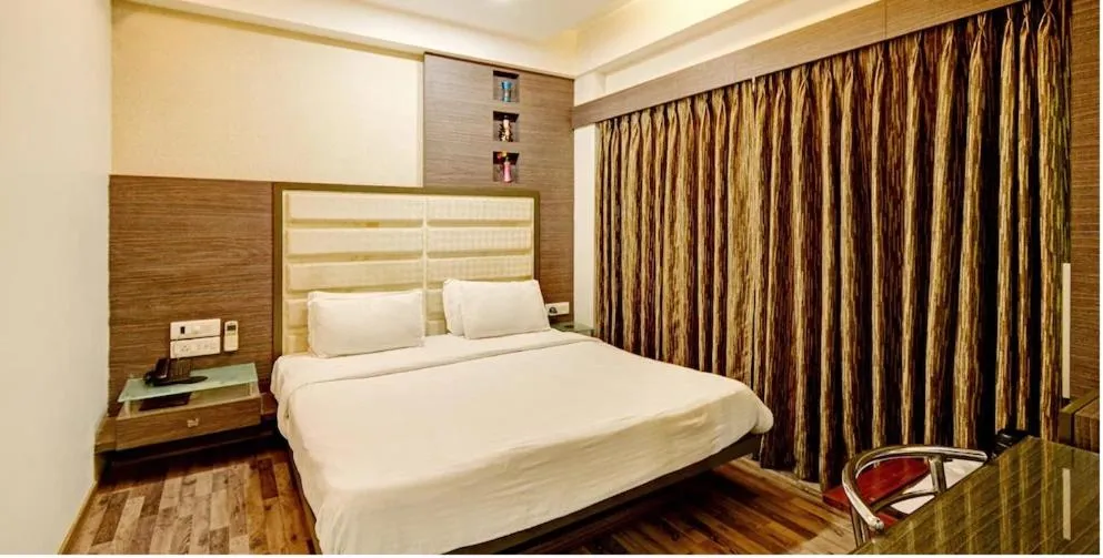 Bed in Atithi The Hotel