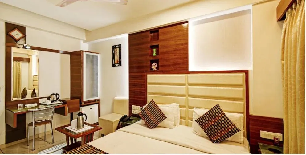 Bed in Atithi The Hotel