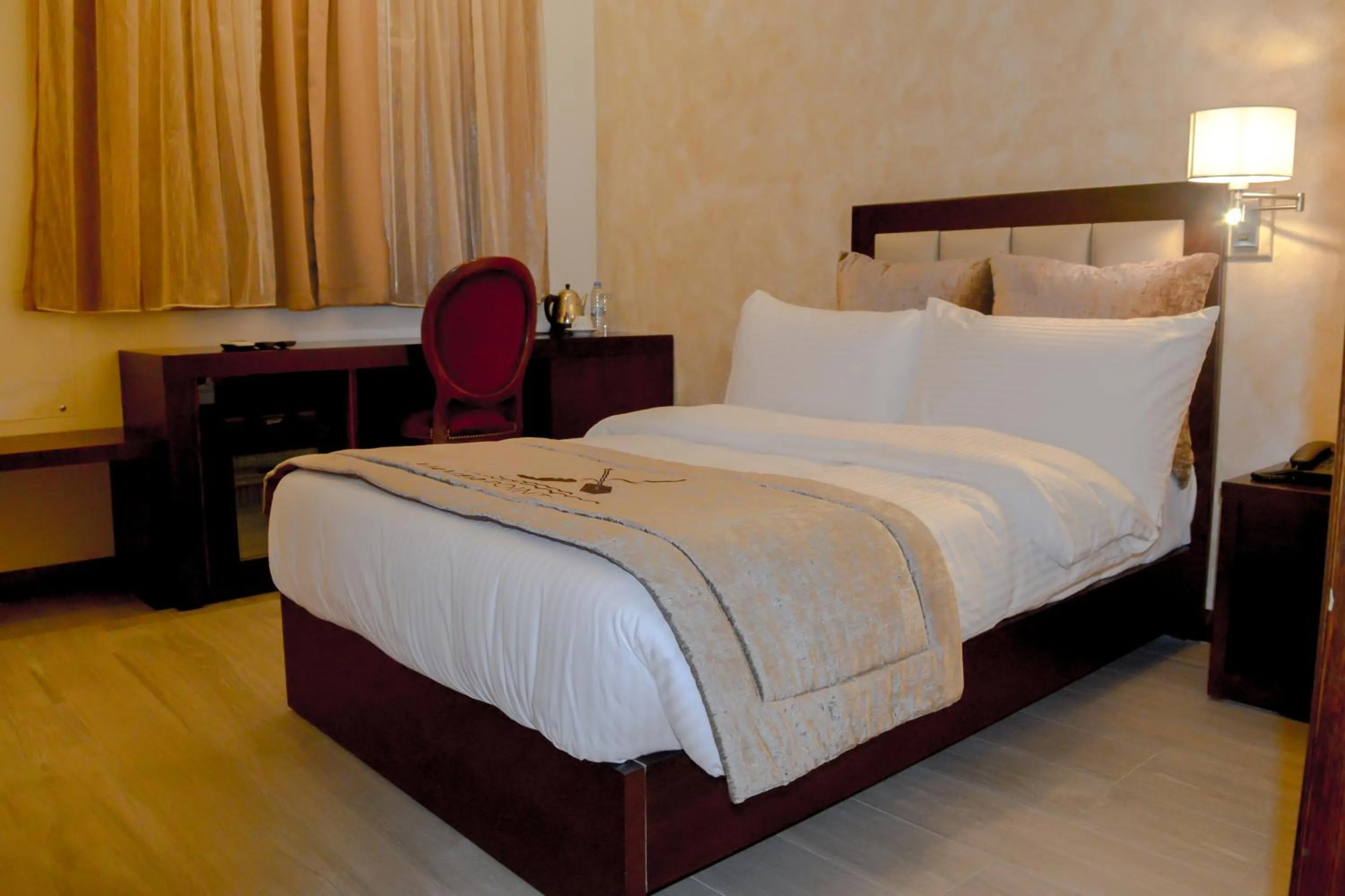 Bed in Mamba Point Hotel