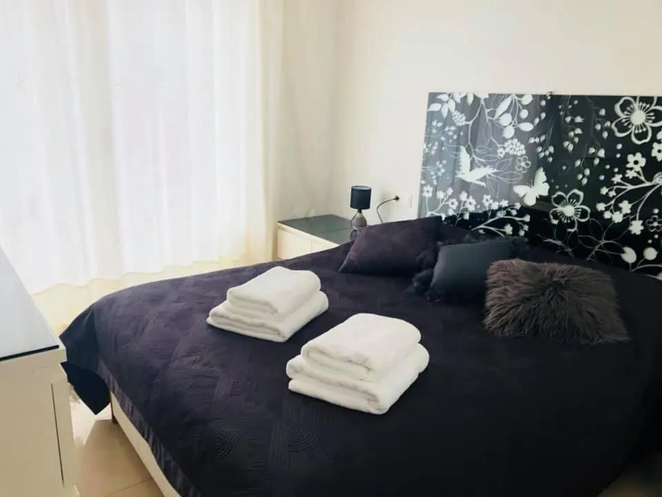 Bed in Don Miguel II Apartments