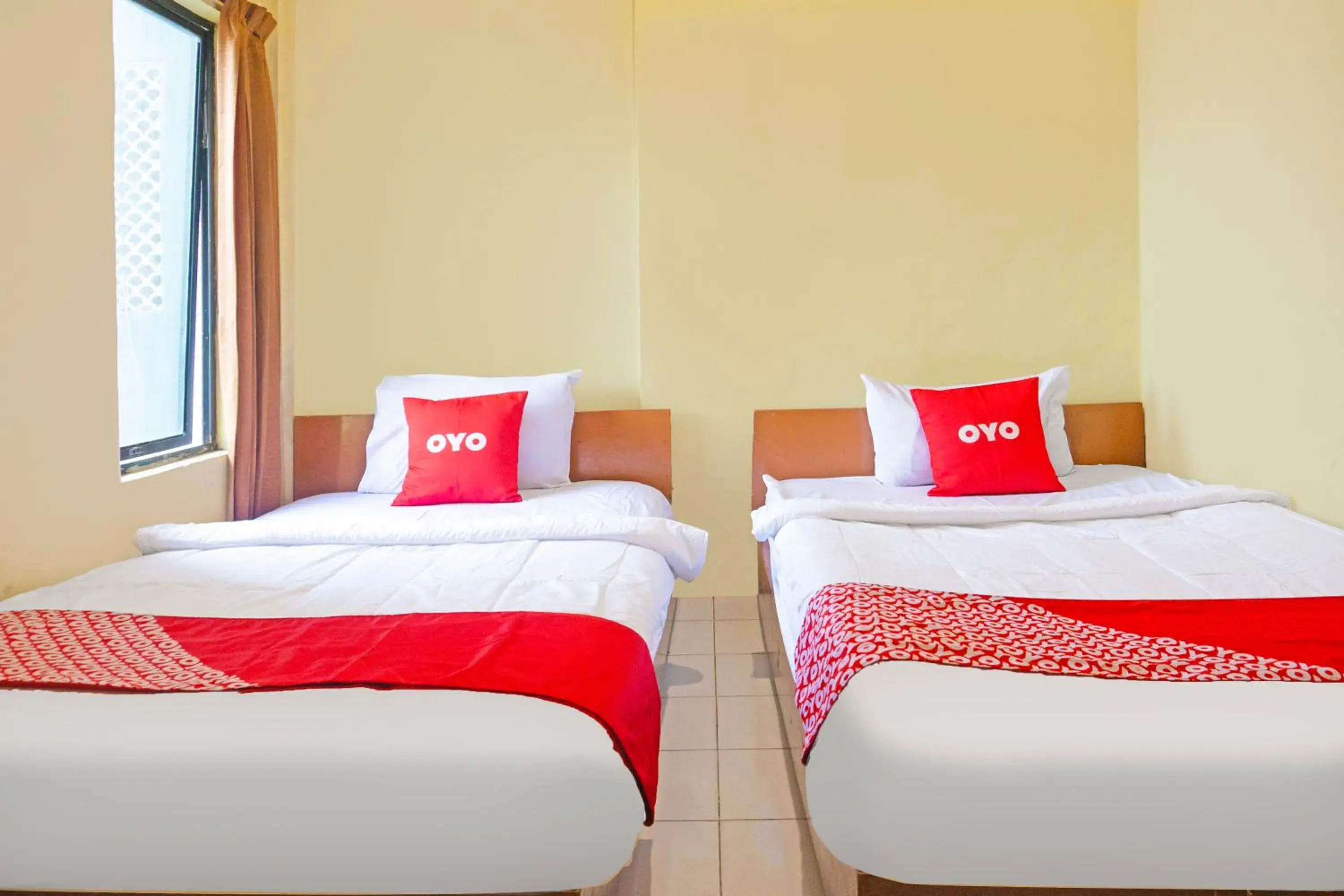 Standard Twin Room in Hotel O Bandar Lampung Near Teropong Kota Bukit Cindy Formerly Divka Residence Standard Twin Room in Hotel O Bandar Lampung Near Teropong Kota Bukit Cindy Formerly Divka Residence