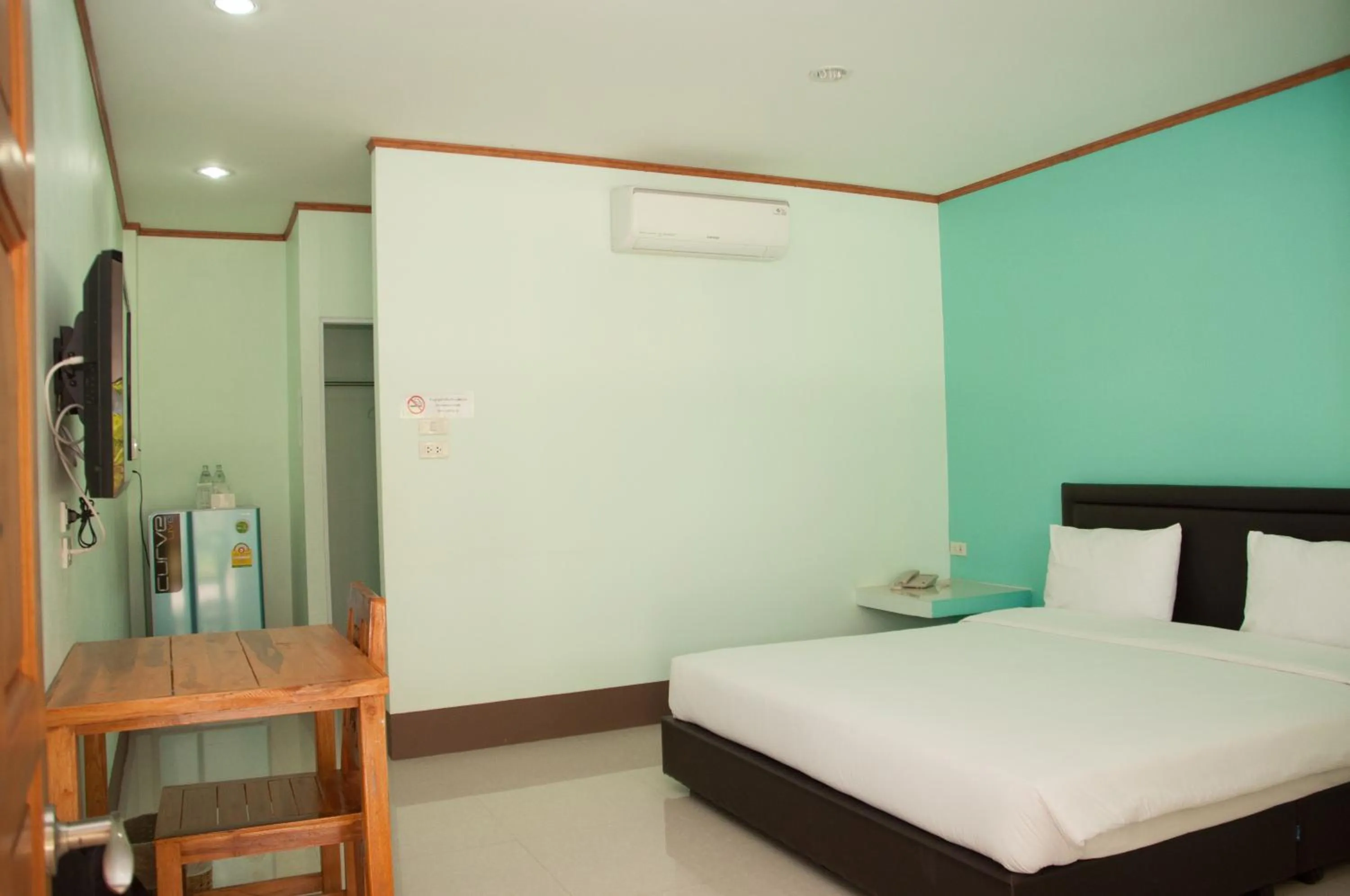 Photo of the whole room, Bed in A Nice Resort