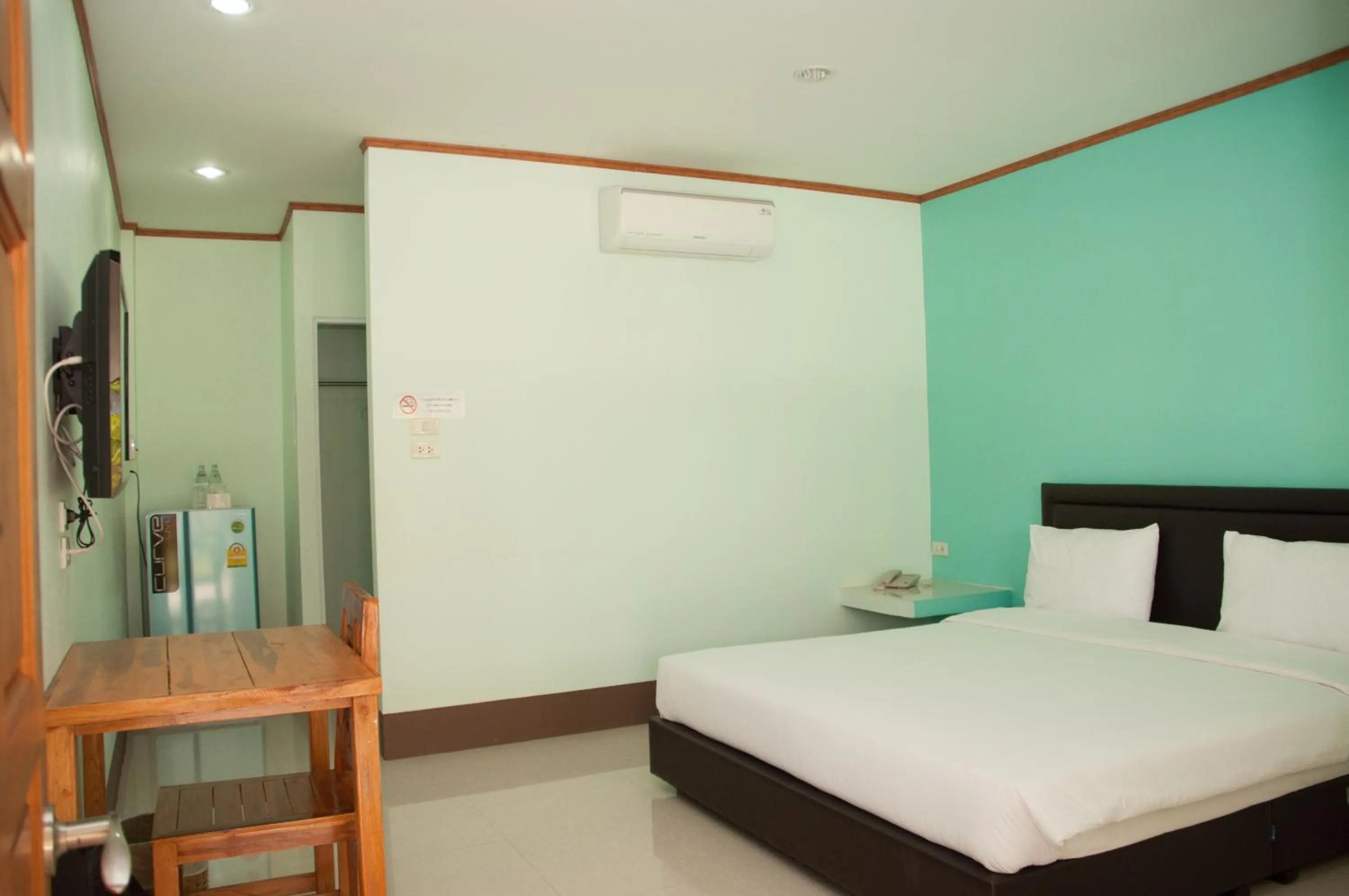 Photo of the whole room, Bed in A Nice Resort