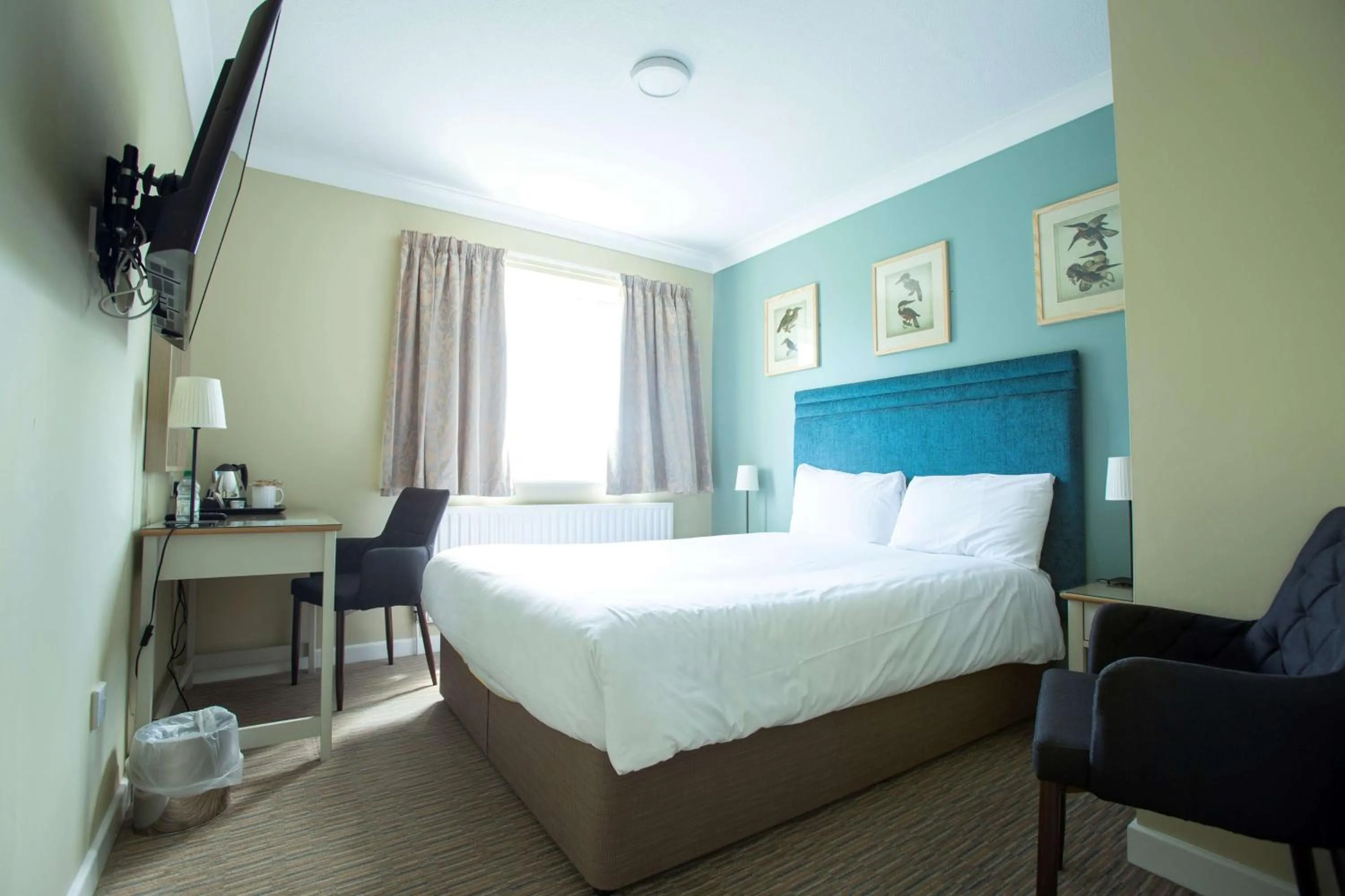 Bed in The Bridge House; BW Signature Collection