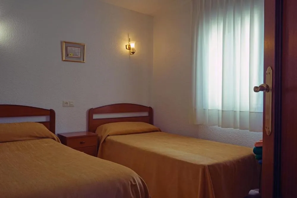 Bed in Apartamentos Las Carabelas