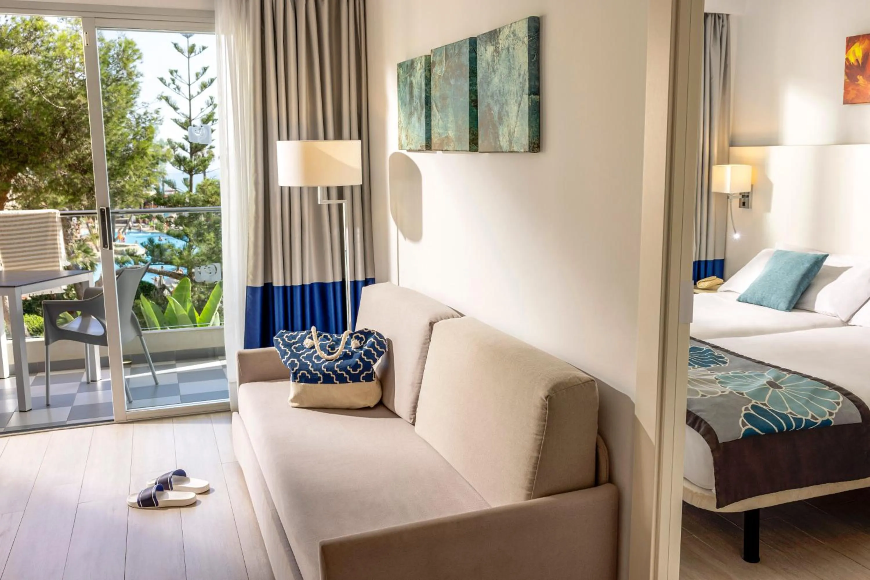 Living room, Bed in Grupotel Alcudia Pins