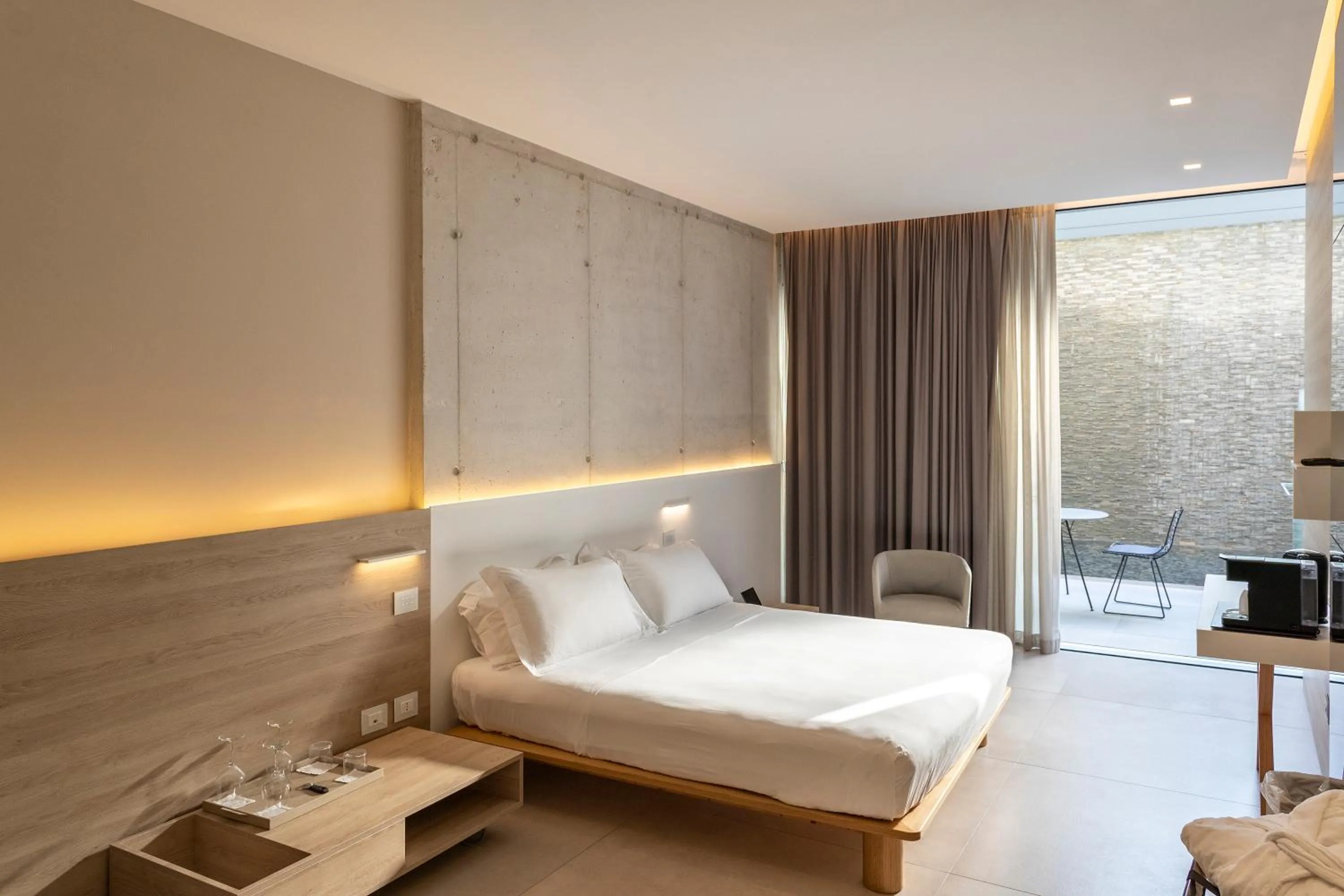 Patio, Bed in Posia Retreat & Spa UNA Esperienze