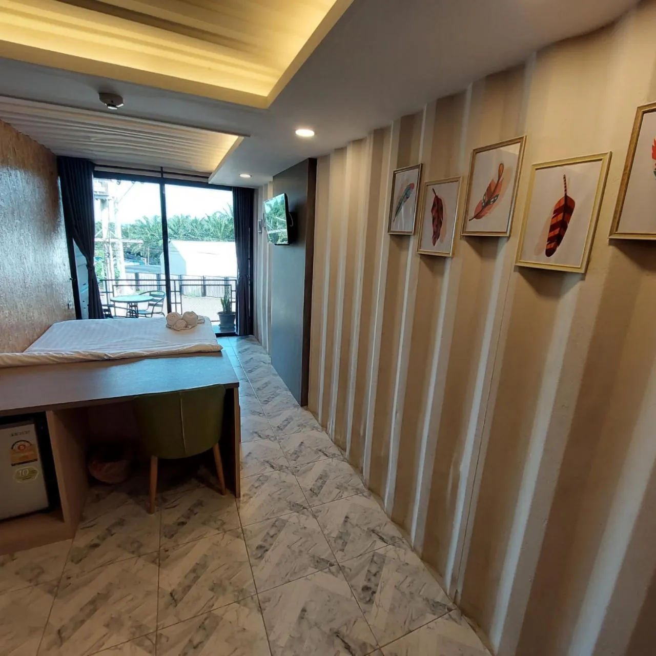 Photo of the whole room in Kipbox Hotel Trang