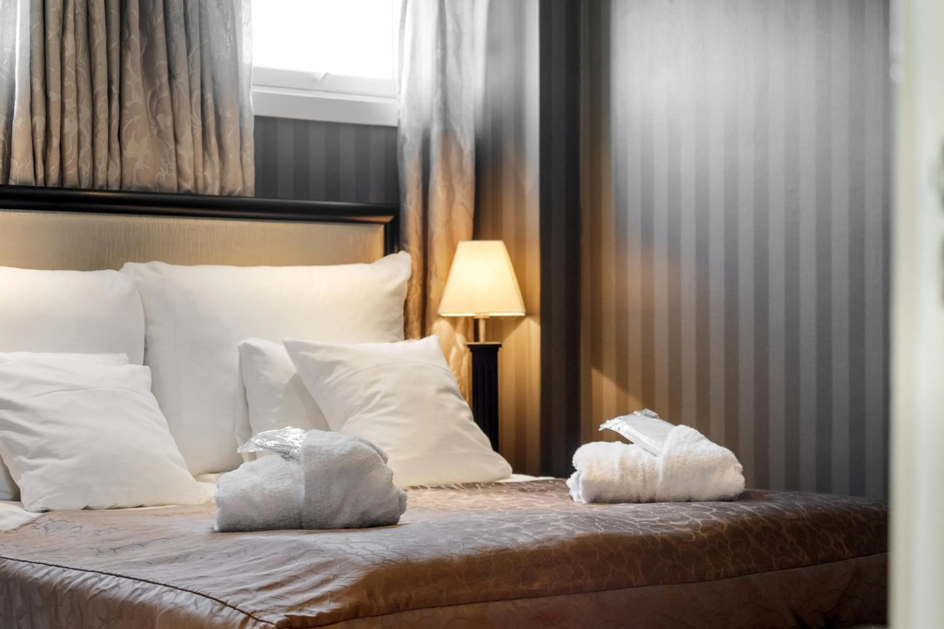 Bed in Frichs Hotel Hamar